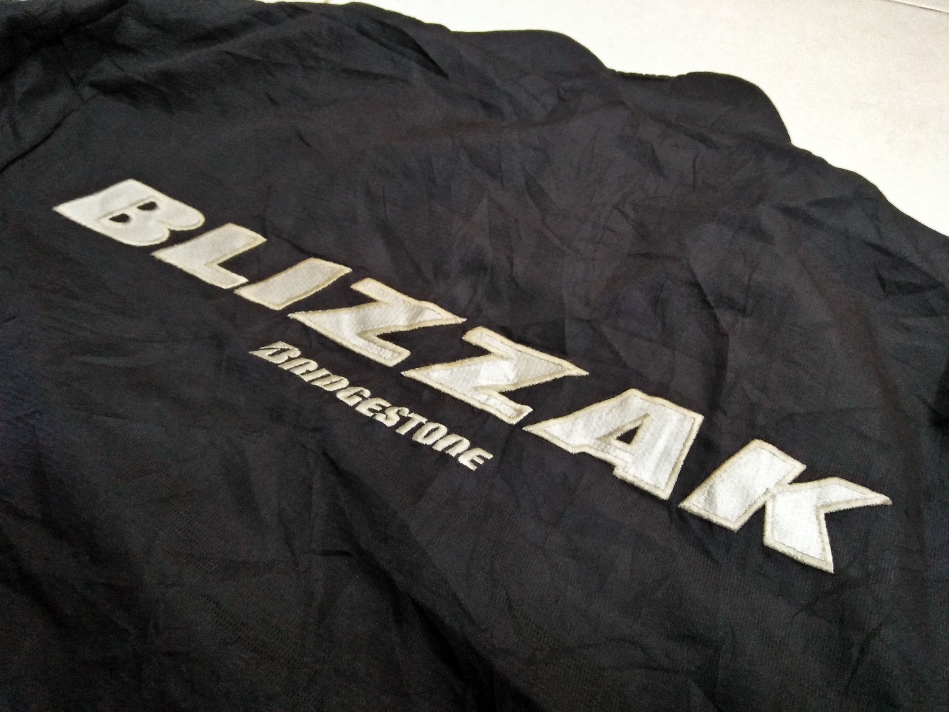 ICON Motorsports BLIZZAX BRIDGESTONE Motorsports Embroidered L Jacket. Size US L / EU 52-54 / 3 - 6 Thumbnail