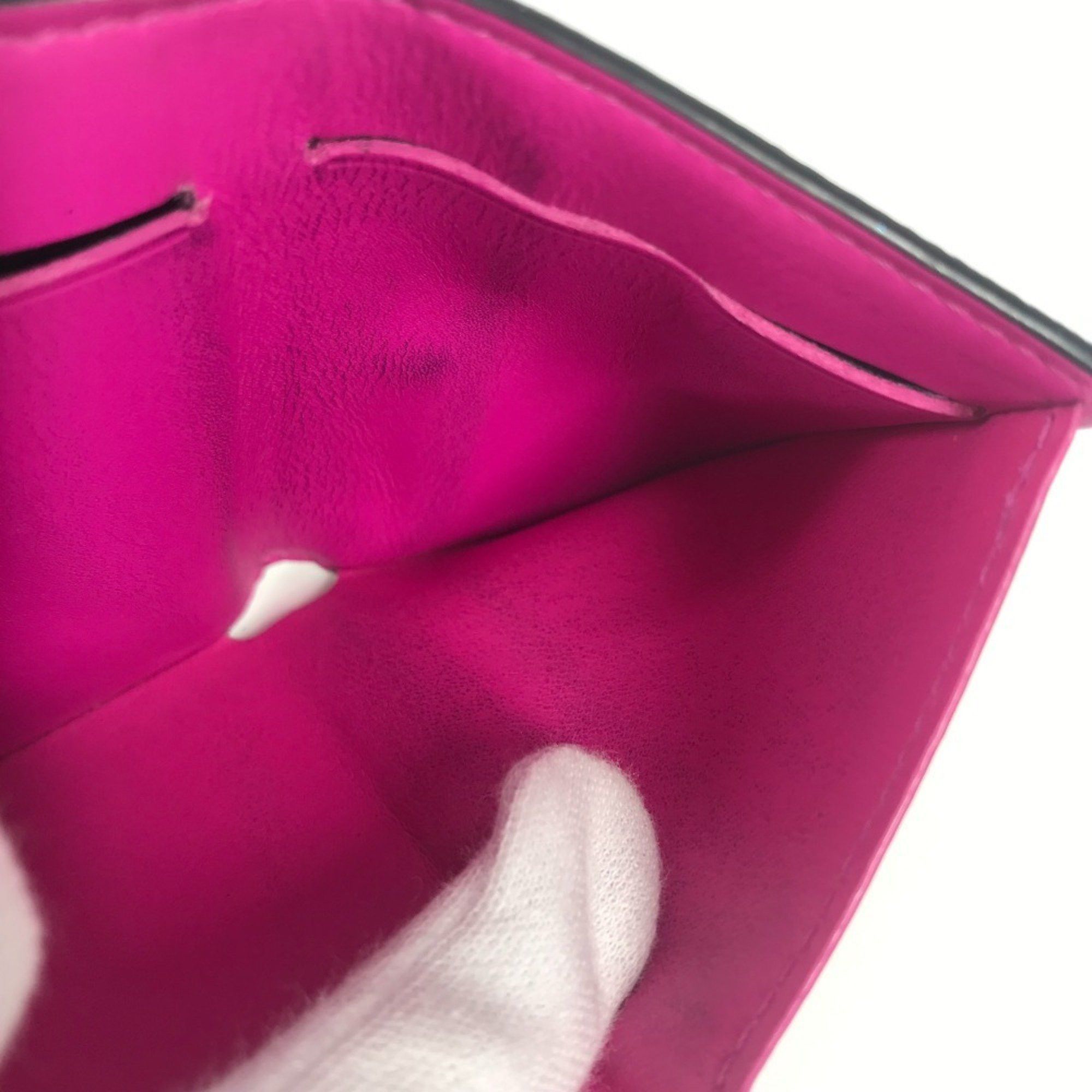 Louis Vuitton LOUIS VUITTON M30773 Taiga Rama Discovery Compact Wallet, a tri-fold wallet in leather and Monogram canvas, available pink for men women. Size ONE SIZE - 6 Thumbnail