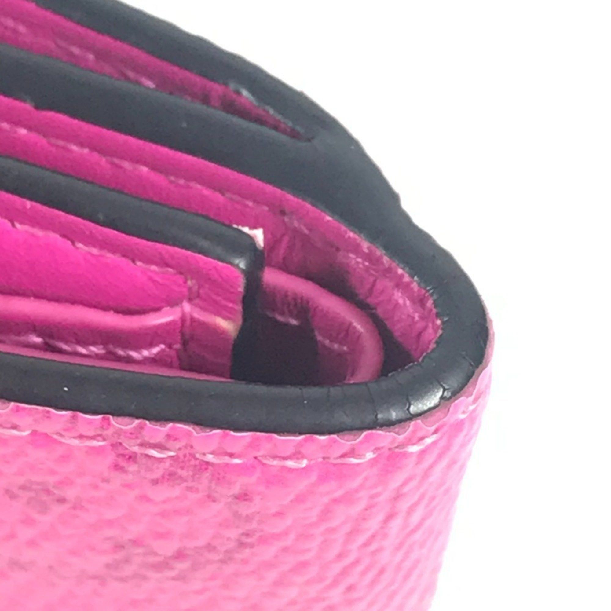 Louis Vuitton LOUIS VUITTON M30773 Taiga Rama Discovery Compact Wallet, a tri-fold wallet in leather and Monogram canvas, available pink for men women. Size ONE SIZE - 3 Thumbnail