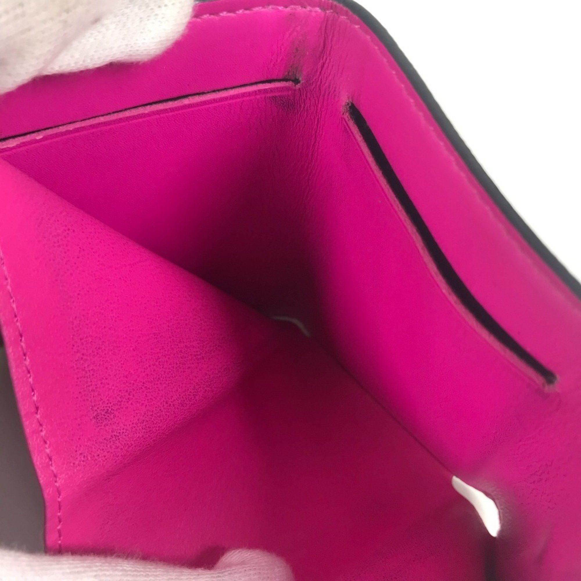 Louis Vuitton LOUIS VUITTON M30773 Taiga Rama Discovery Compact Wallet, a tri-fold wallet in leather and Monogram canvas, available pink for men women. Size ONE SIZE - 5 Thumbnail
