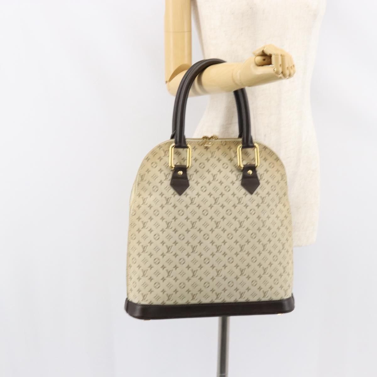 Louis Vuitton Louis Vuitton Alma Handbag Mini Lin Monogram Size ONE SIZE - 14 Thumbnail