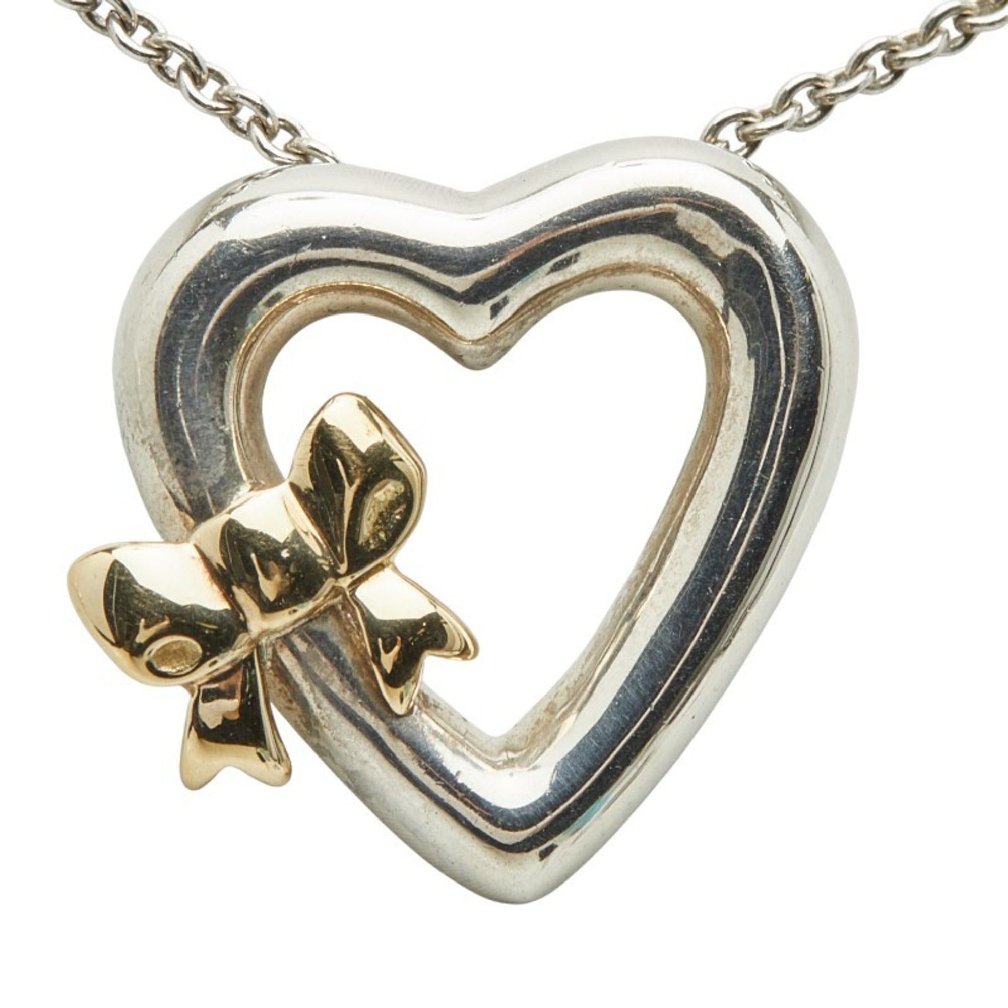 Tiffany & Co. Vintage Heart Ribbon Pendant Necklace in 925 Sterling Silver and 18K Yellow Gold (stamped 750). Women's. TIFFANY