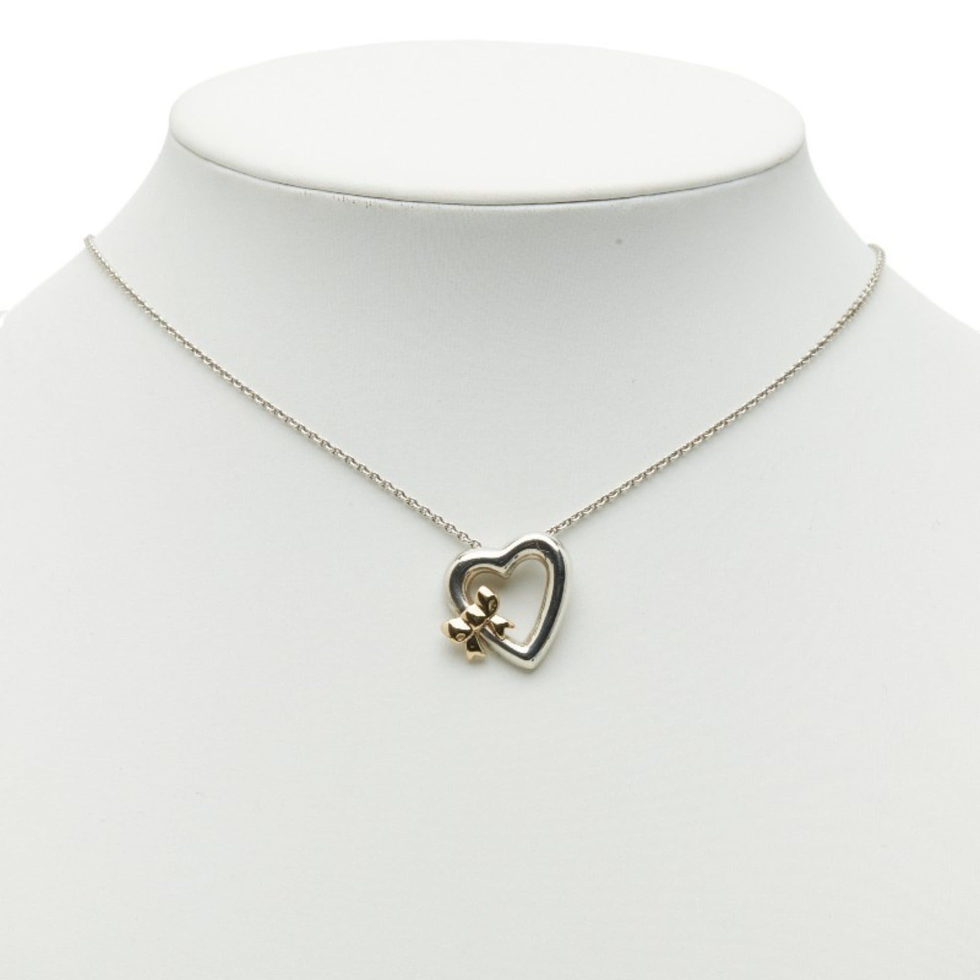 Tiffany & Co. Vintage Heart Ribbon Pendant Necklace in 925 Sterling Silver and 18K Yellow Gold (stamped 750). Women's. TIFFANY