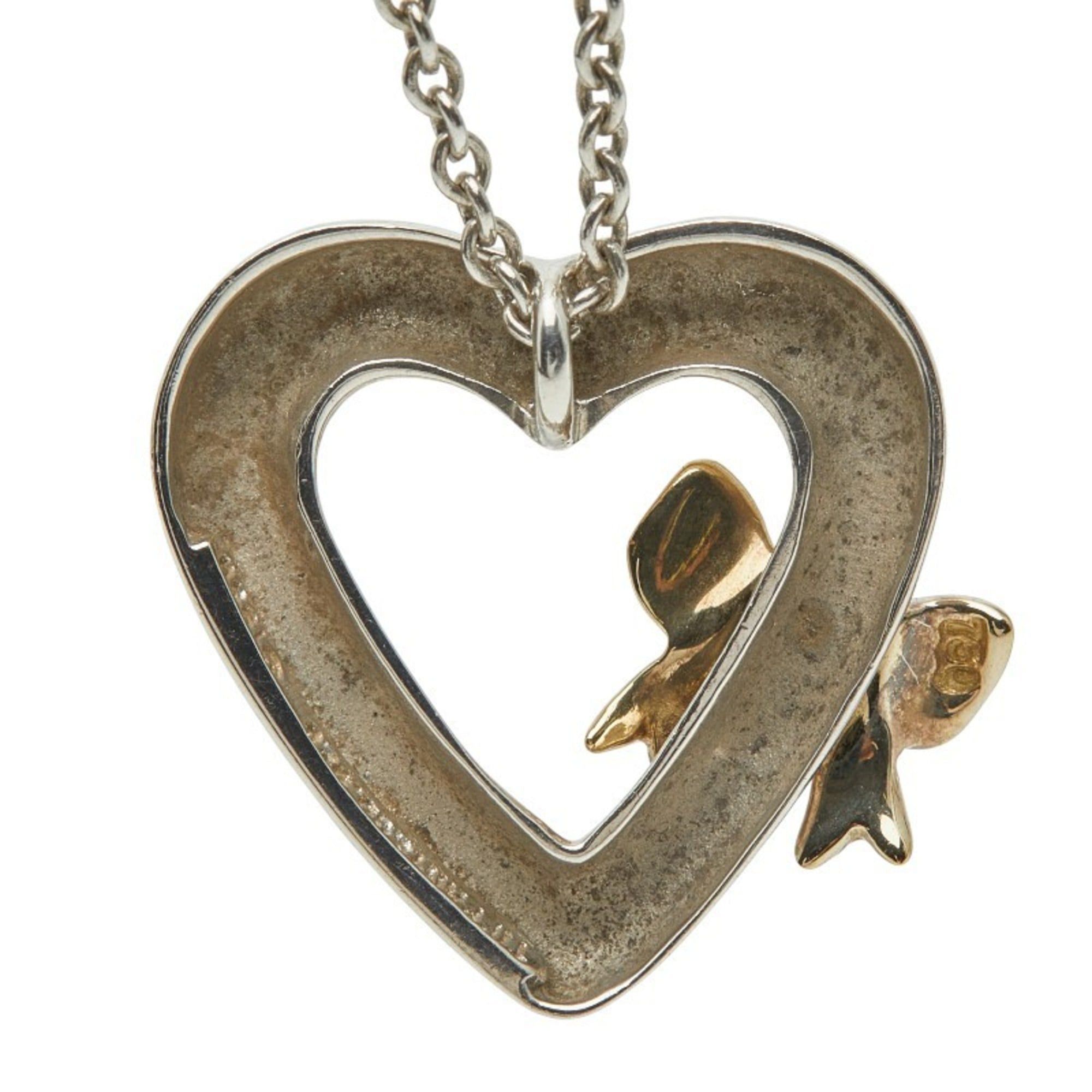 Tiffany & Co. Vintage Heart Ribbon Pendant Necklace in 925 Sterling Silver and 18K Yellow Gold (stamped 750). Women's. TIFFANY