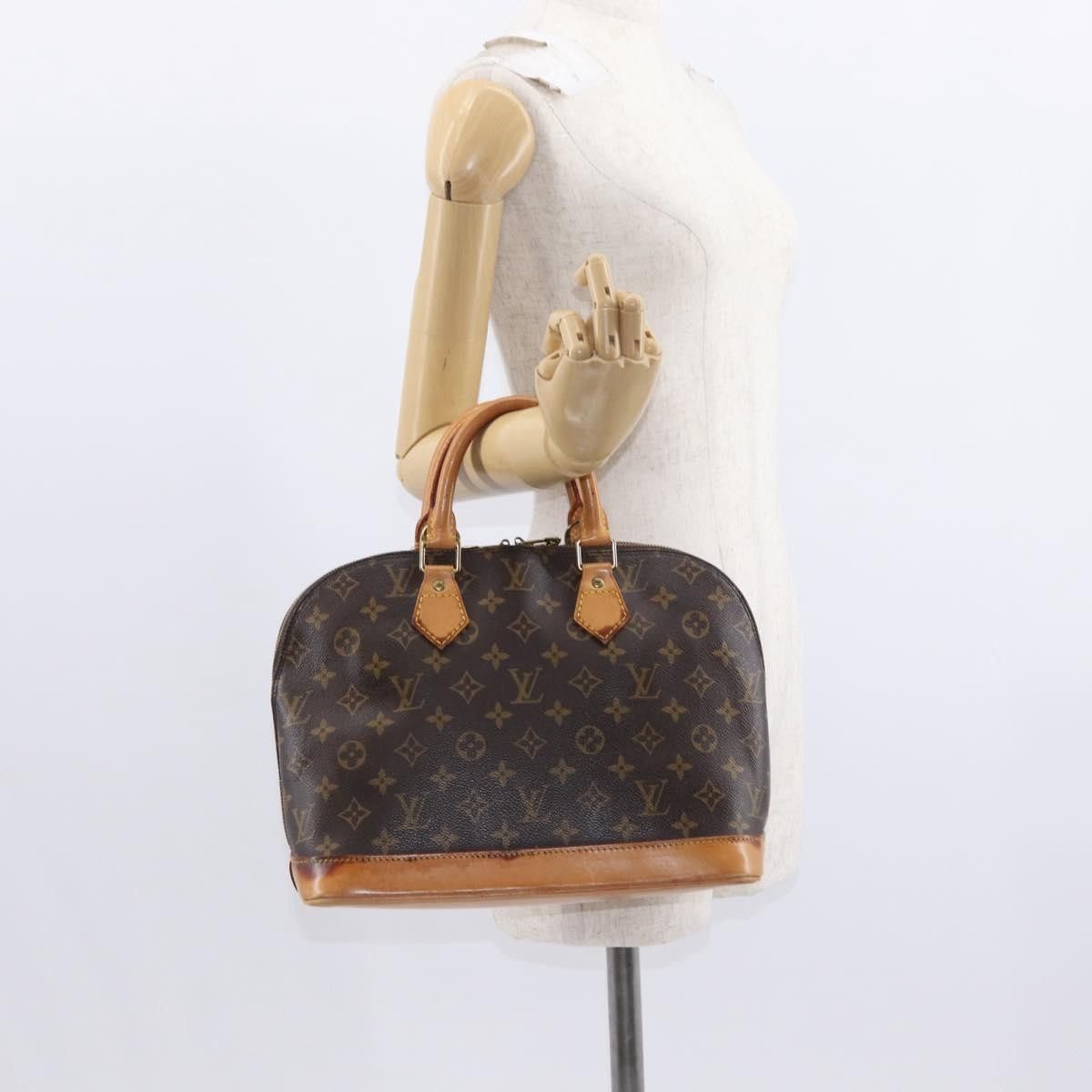 Louis Vuitton Louis Vuitton Alma Handbag Monogram Canvas Size ONE SIZE - 14 Thumbnail