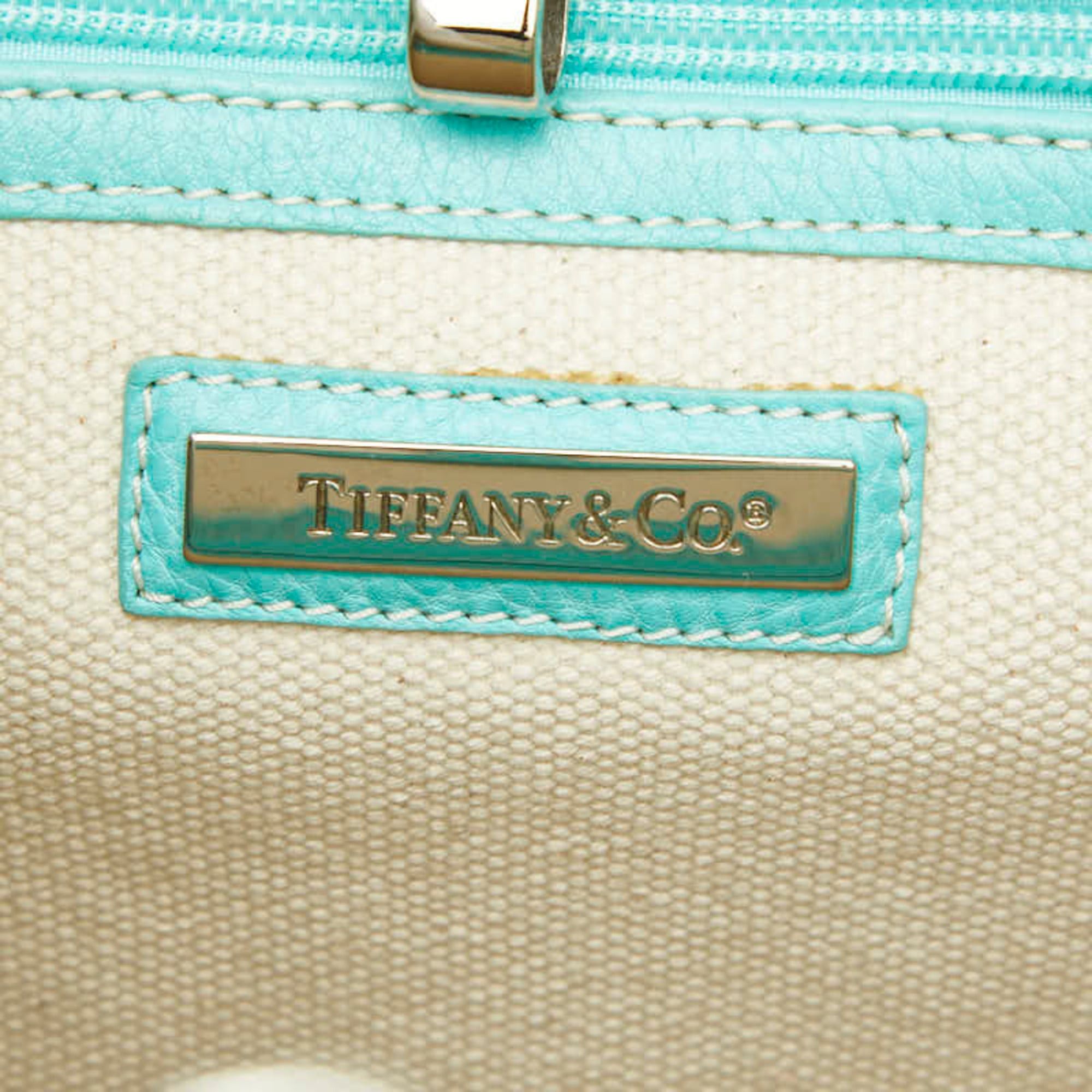 Tiffany & Co. Tiffany & Co. 2-way handbag/shoulder bag in white and Blue canvas leather. Women's. TIFFANY Size ONE SIZE - 11 Thumbnail