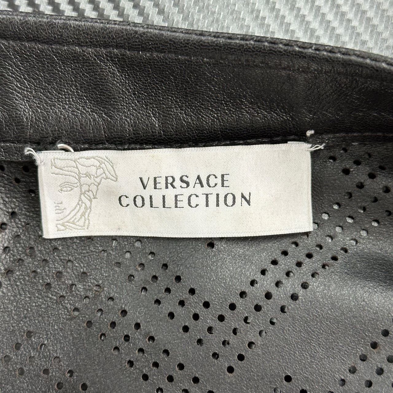 Versace black perforated leather jacket by Versace Size US M / EU 48-50 / 2 - 3 Thumbnail
