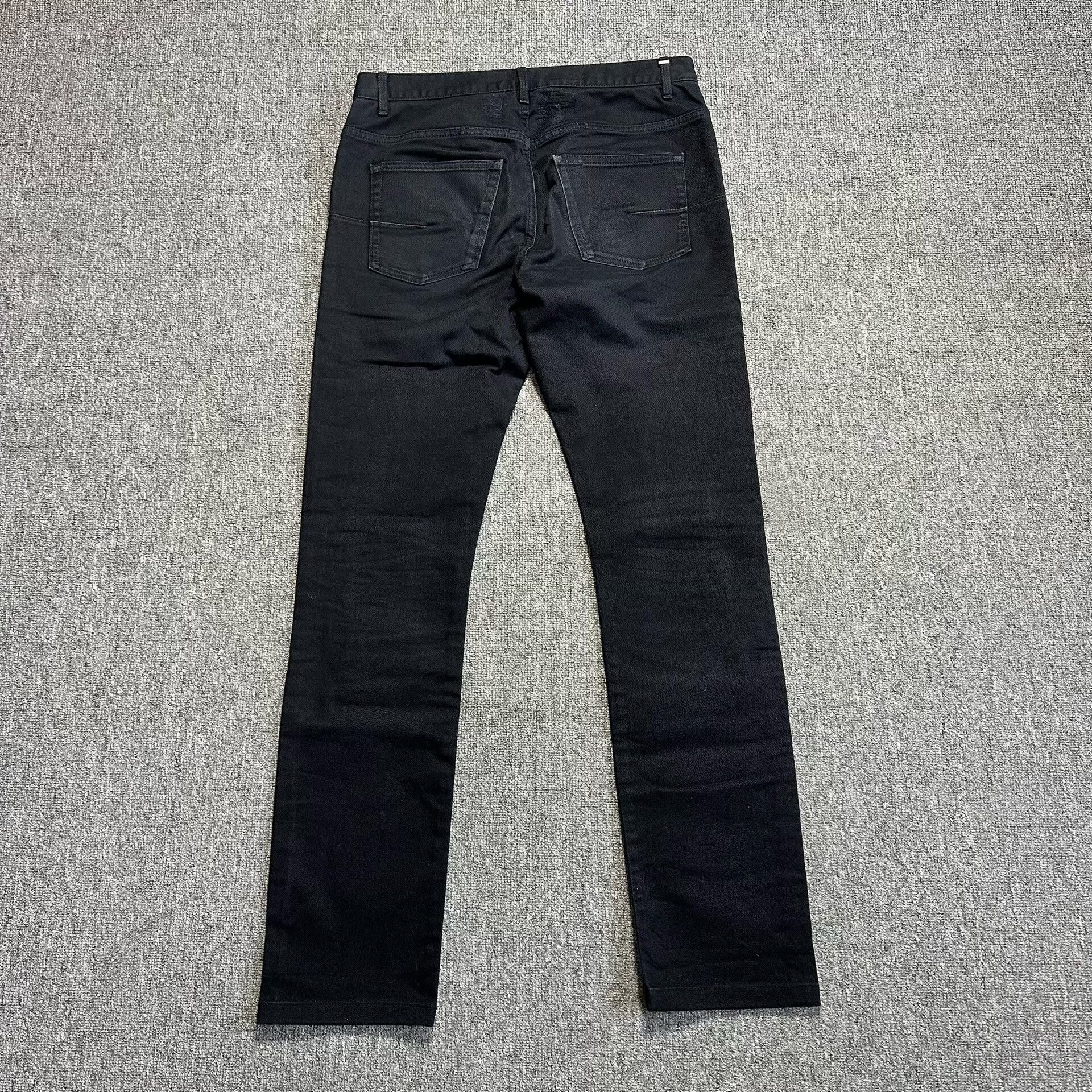 dior black distressed denim jeans