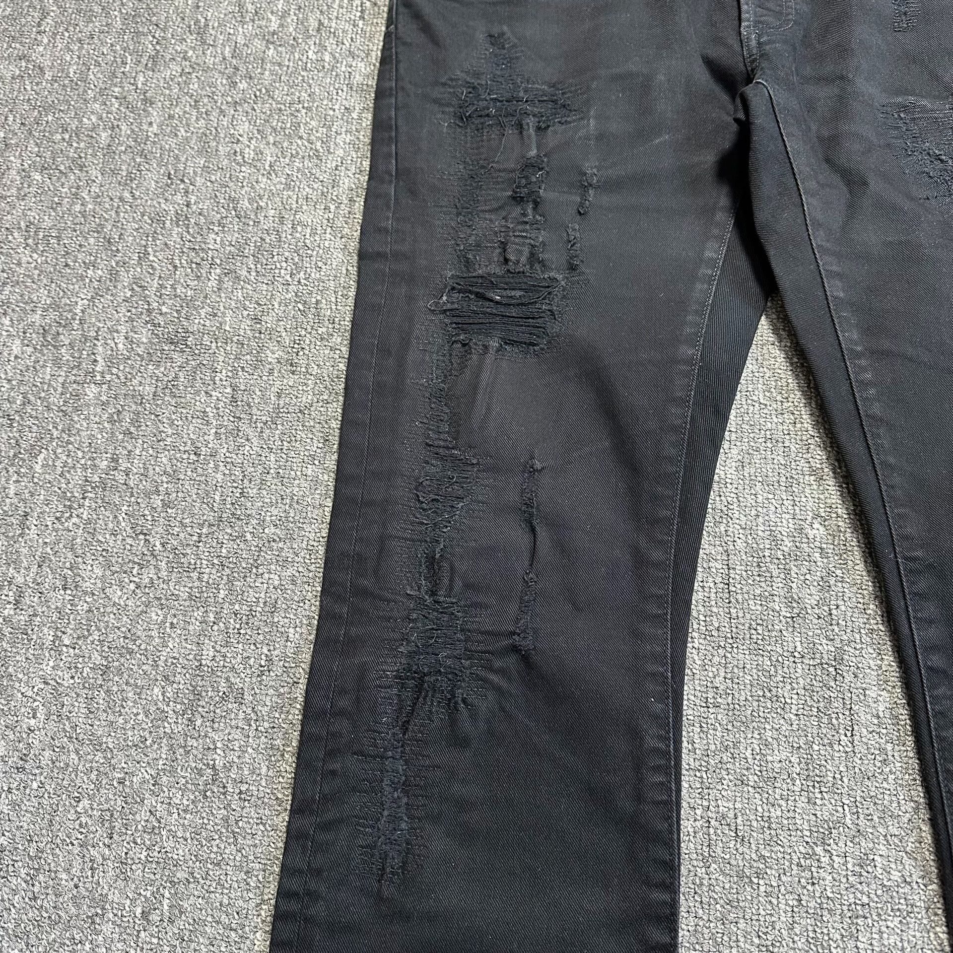 dior black distressed denim jeans