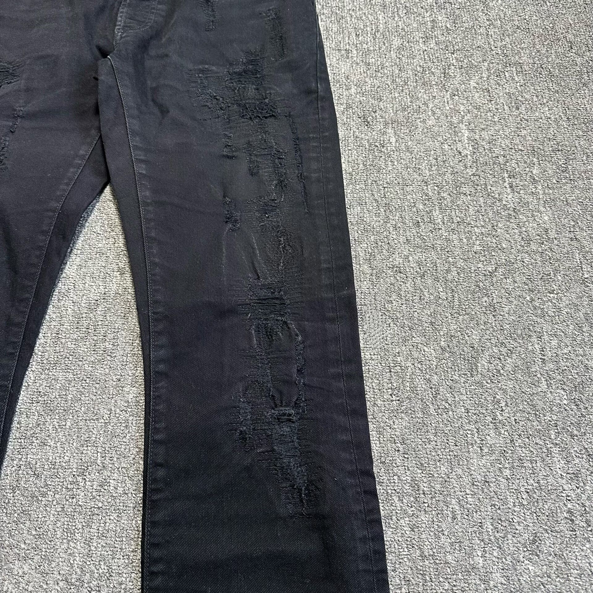 dior black distressed denim jeans