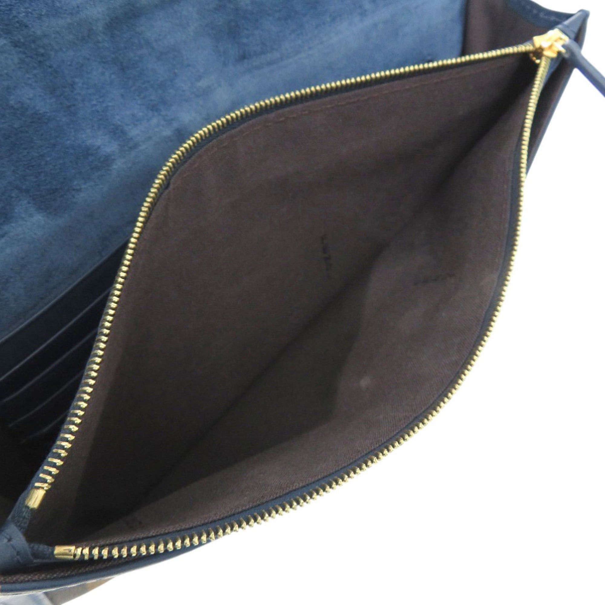 Fendi Excellent condition Fendi Pecan pattern clutch bag 8M0284 in leather and canvas, blue brown. 0475FENDI Size ONE SIZE - 7 Thumbnail