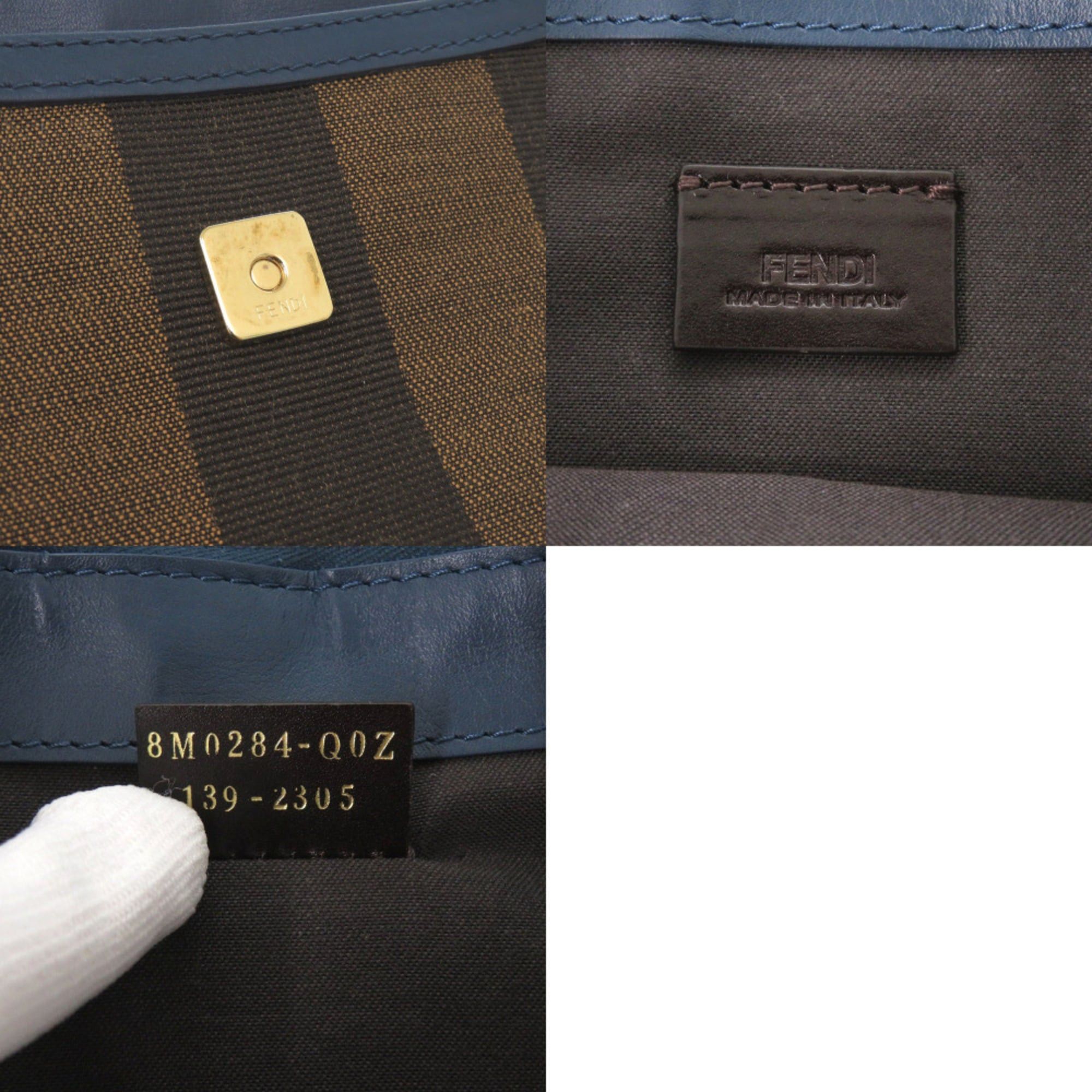 Fendi Excellent condition Fendi Pecan pattern clutch bag 8M0284 in leather and canvas, blue brown. 0475FENDI Size ONE SIZE - 8 Thumbnail