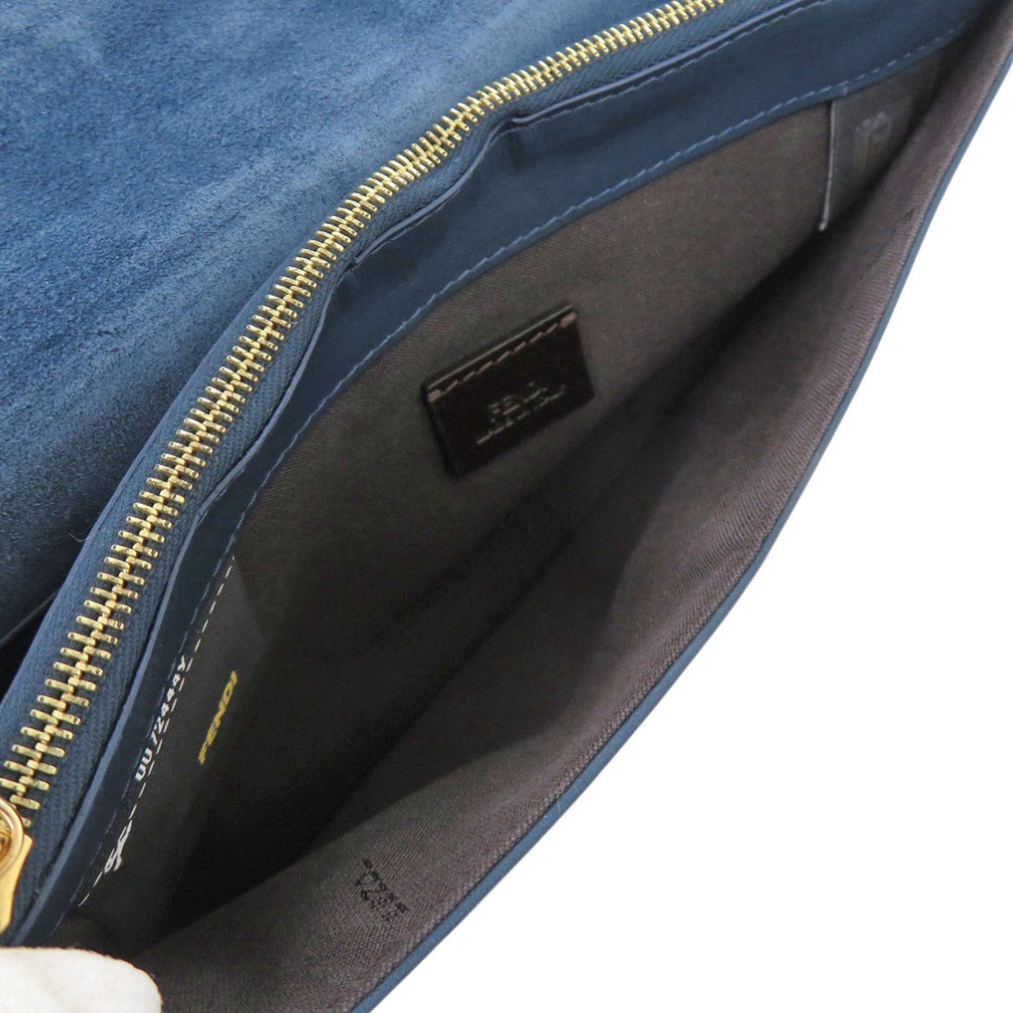 Fendi Excellent condition Fendi Pecan pattern clutch bag 8M0284 in leather and canvas, blue brown. 0475FENDI Size ONE SIZE - 6 Thumbnail
