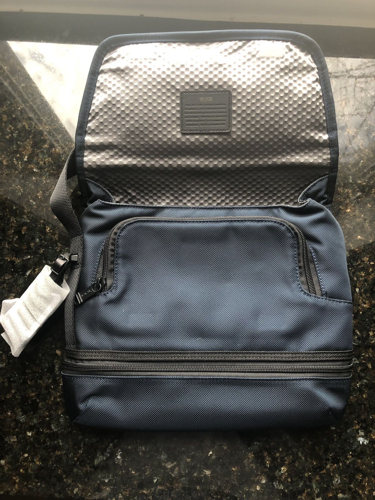 Tumi travis sales