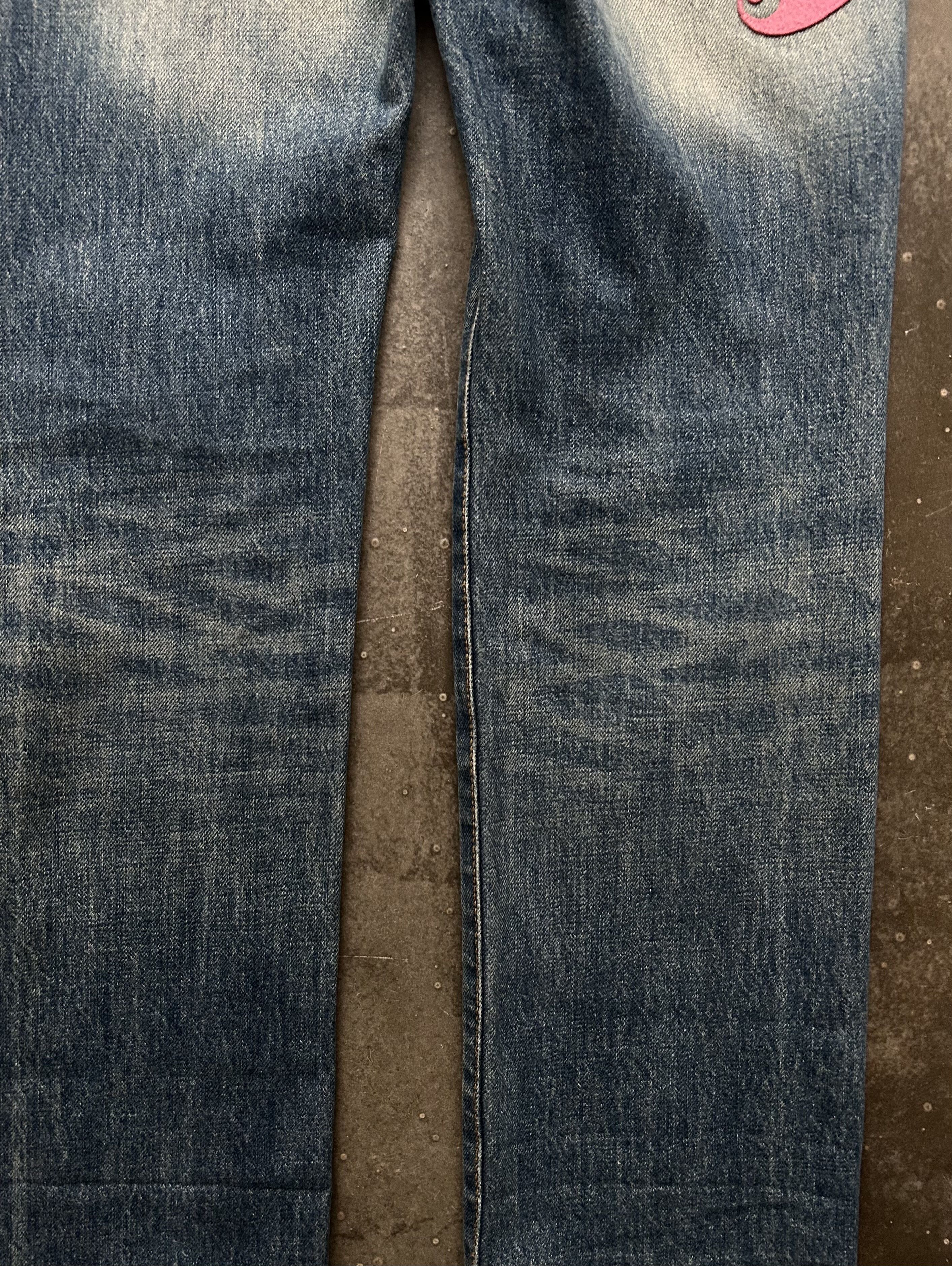 undercover love lightning denim pants