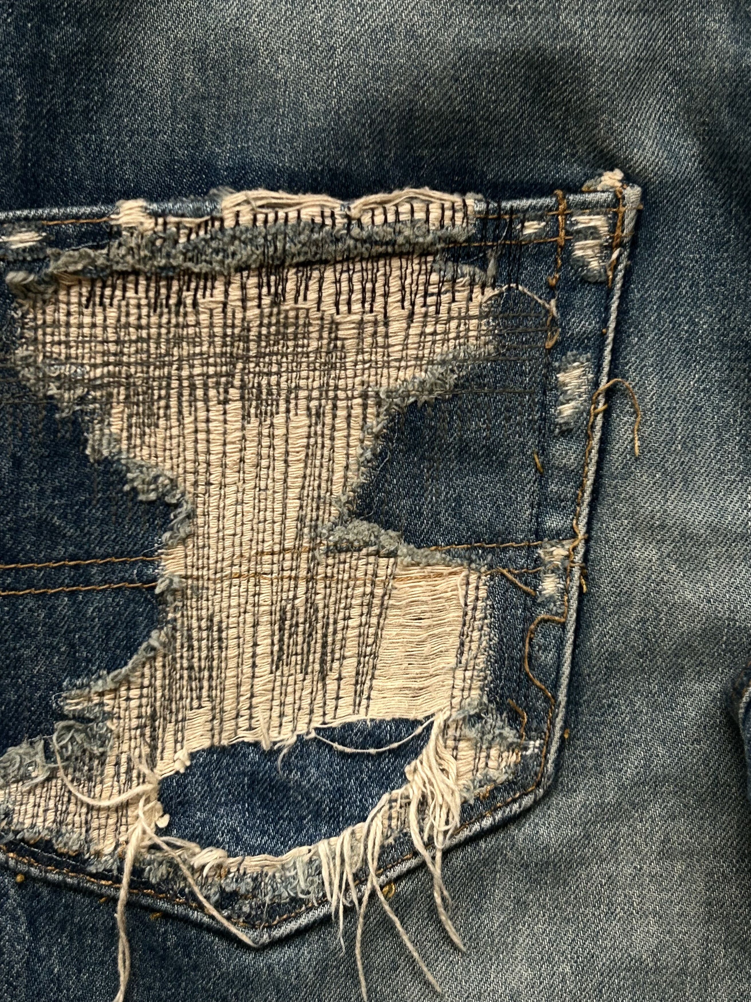 undercover love lightning denim pants
