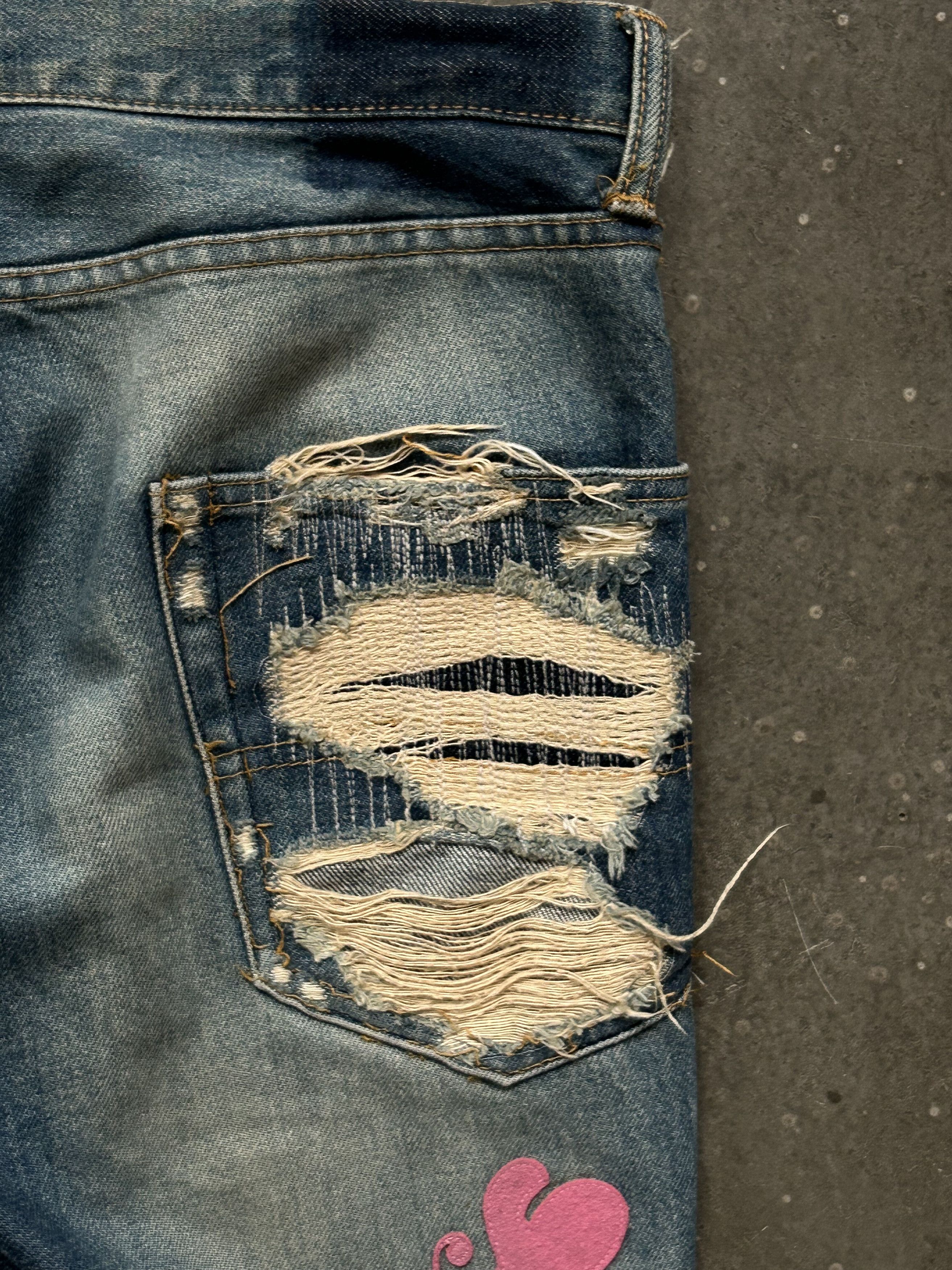 undercover love lightning denim pants