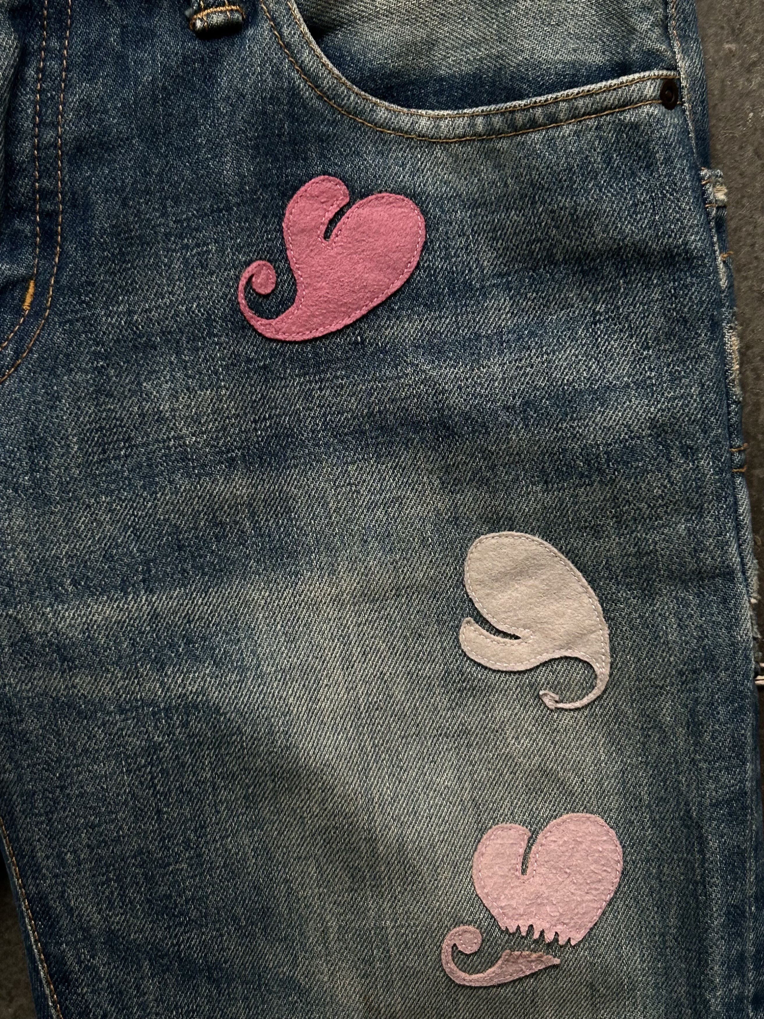 undercover love lightning denim pants