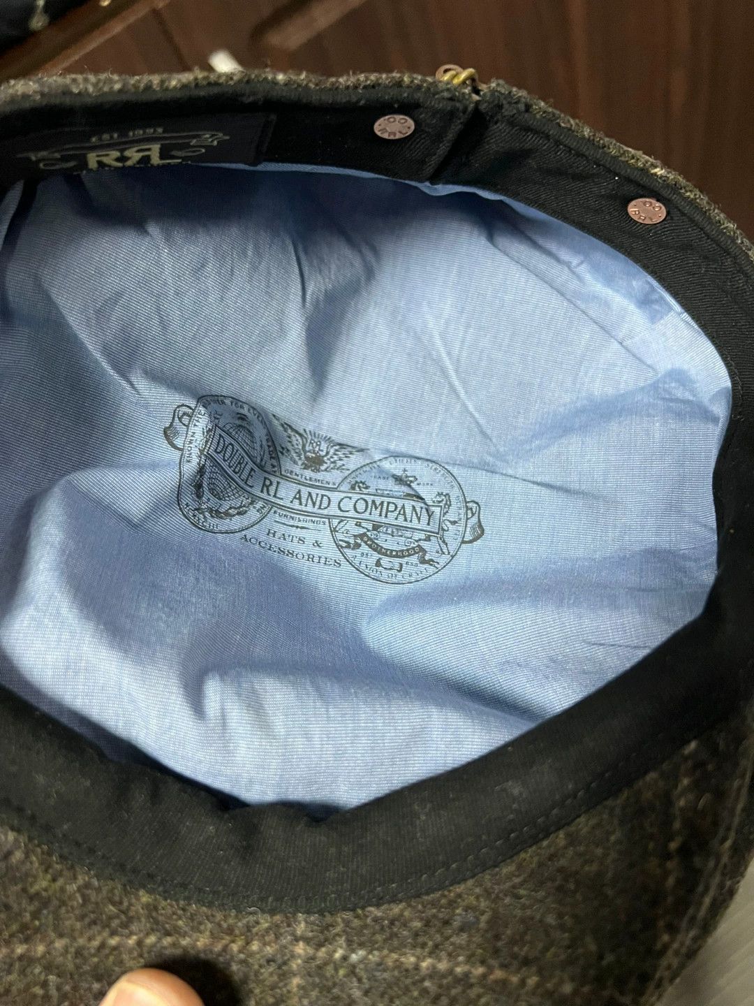 gray newsboy cap with plaid pattern