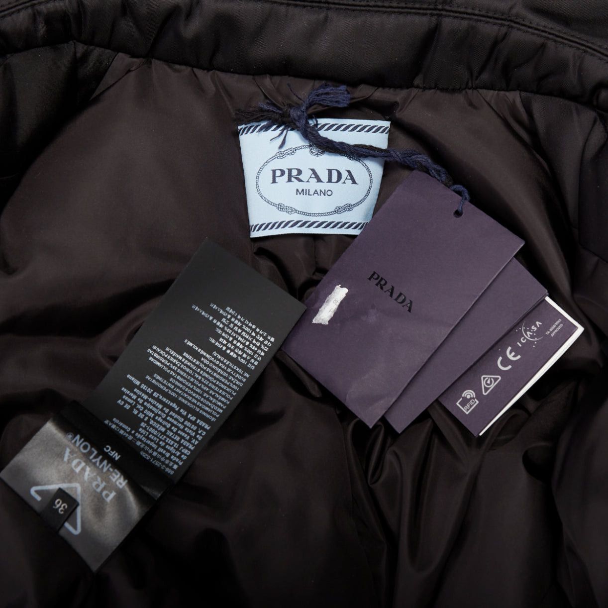 Prada PRADA 2022 Re-Nylon black silver logo flap pocket technical puffer coat IT36 XXS Size XS / US 0-2 / IT 36-38 - 9 Thumbnail