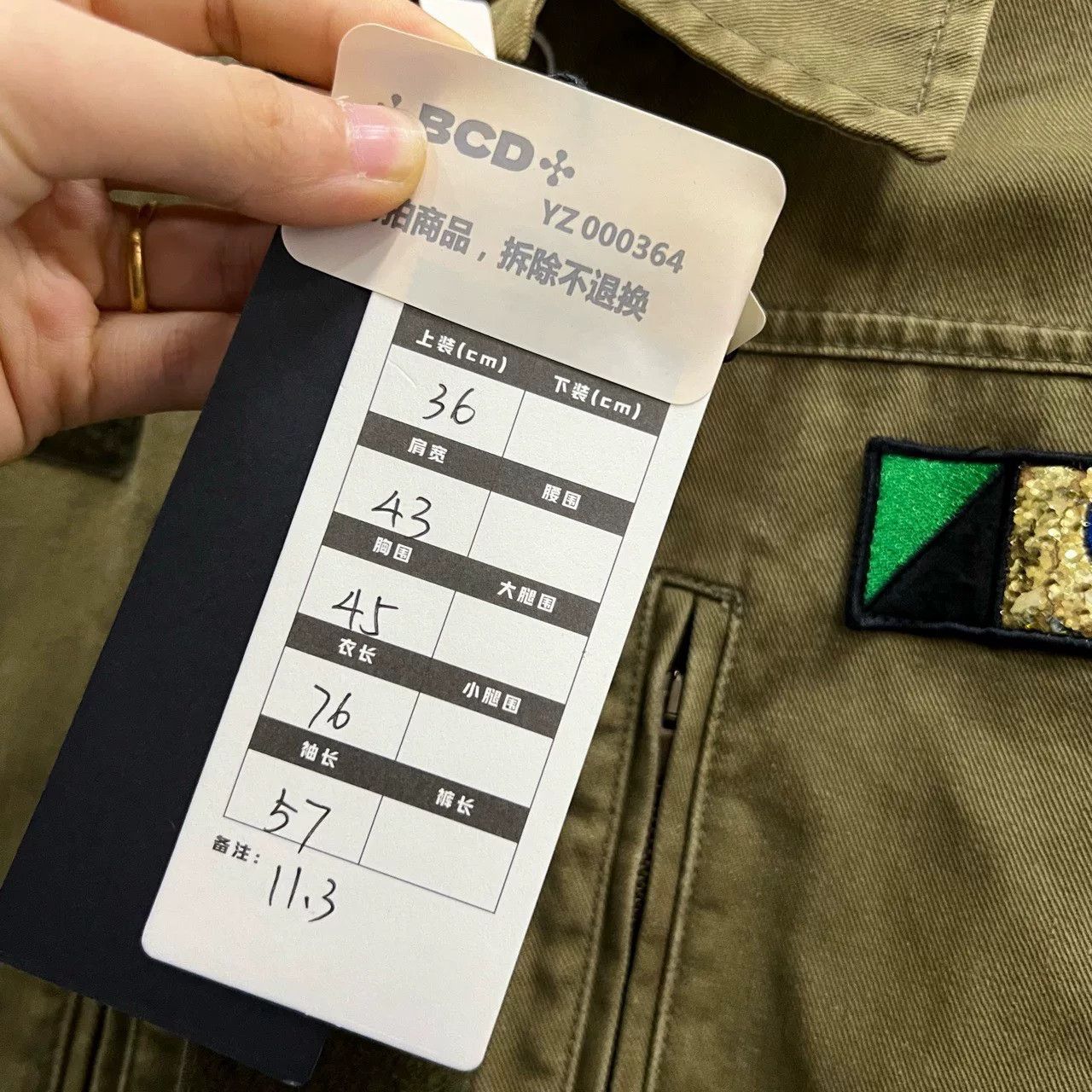 saint laurent green embroidered logo denim jacket