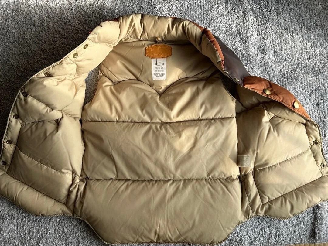 Rocky Mountain Featherbed rocky mountain down vest in brown color Size US S / EU 44-46 / 1 - 7 Thumbnail