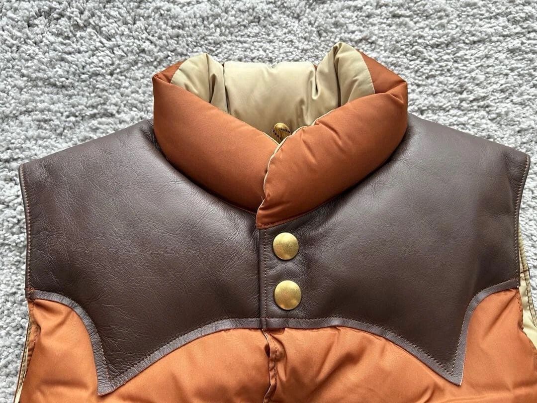 Rocky Mountain Featherbed rocky mountain down vest in brown color Size US S / EU 44-46 / 1 - 3 Thumbnail