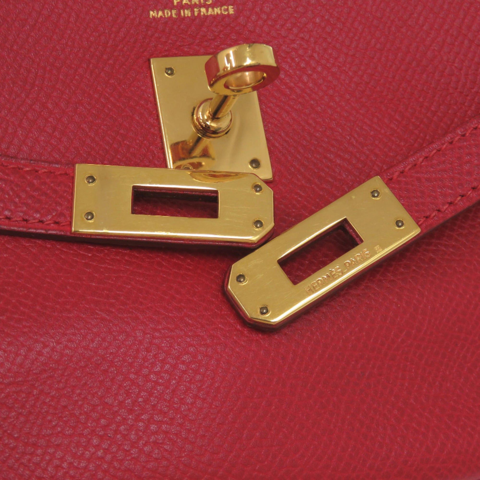 Hermes Excellent condition Hermès Banana Kelly Couchbel Rouge vif clutch bag in red with gold hardware and a 〇U stamp. Item number 1465. Size ONE SIZE - 7 Thumbnail