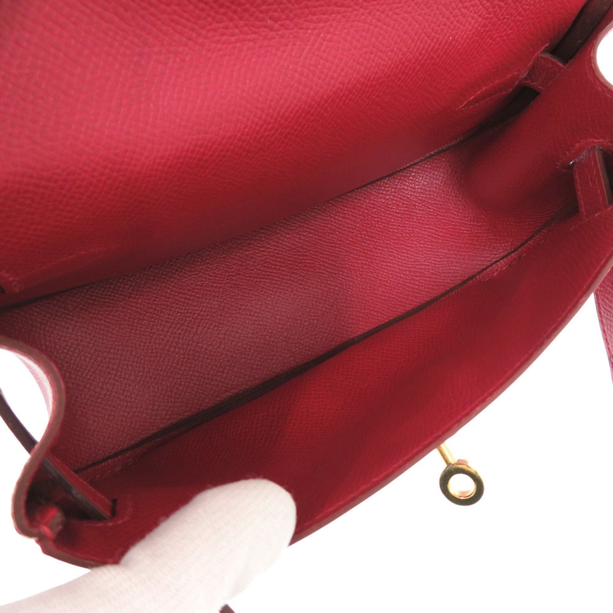 Hermes Excellent condition Hermès Banana Kelly Couchbel Rouge vif clutch bag in red with gold hardware and a 〇U stamp. Item number 1465. Size ONE SIZE - 5 Thumbnail