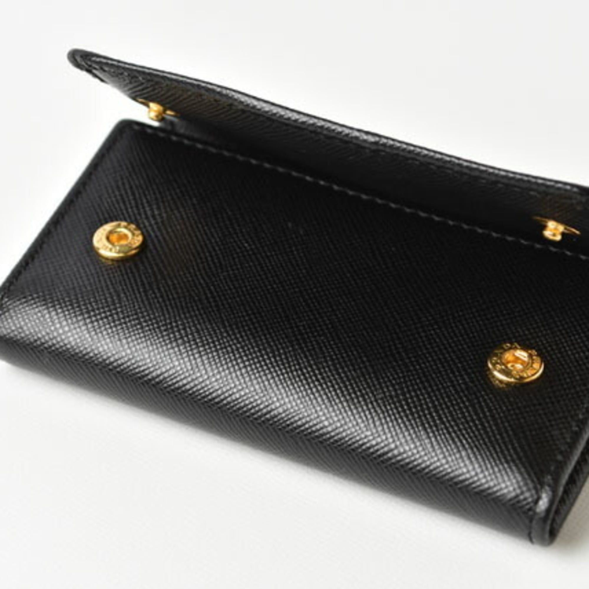 Prada Prada 6-ring key case, holder, 1PG222, SAFFIANO METAL embossed leather, NERO black, unused, outlet Size ONE SIZE - 8 Thumbnail