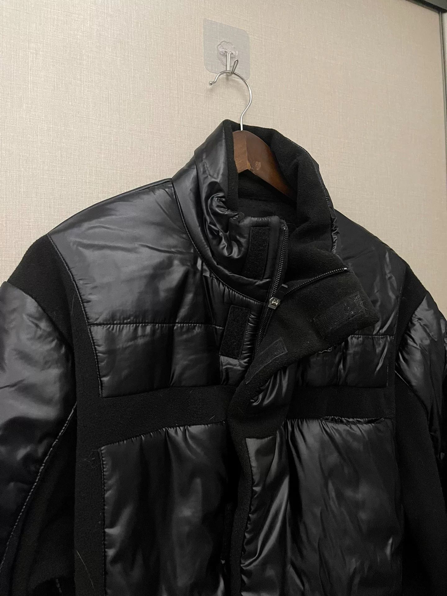 black puffy jacket with hidden pockets