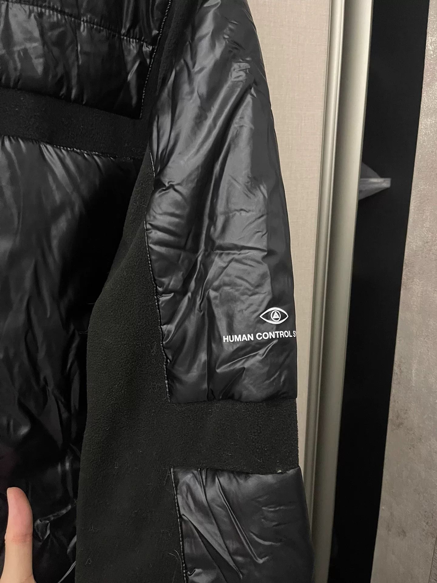 black puffy jacket with hidden pockets