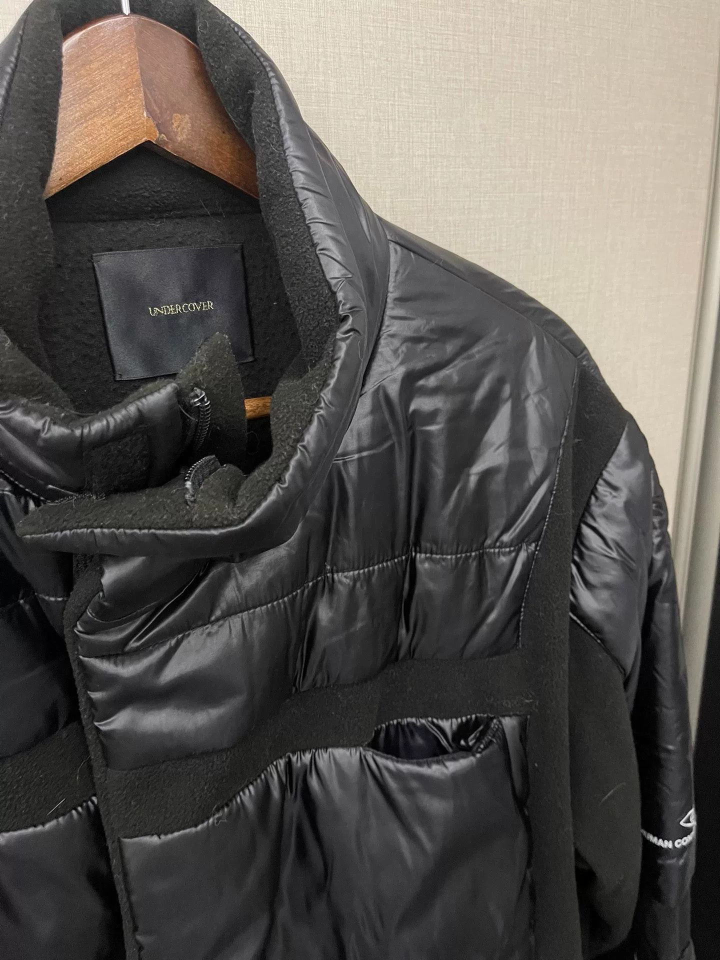 black puffy jacket with hidden pockets