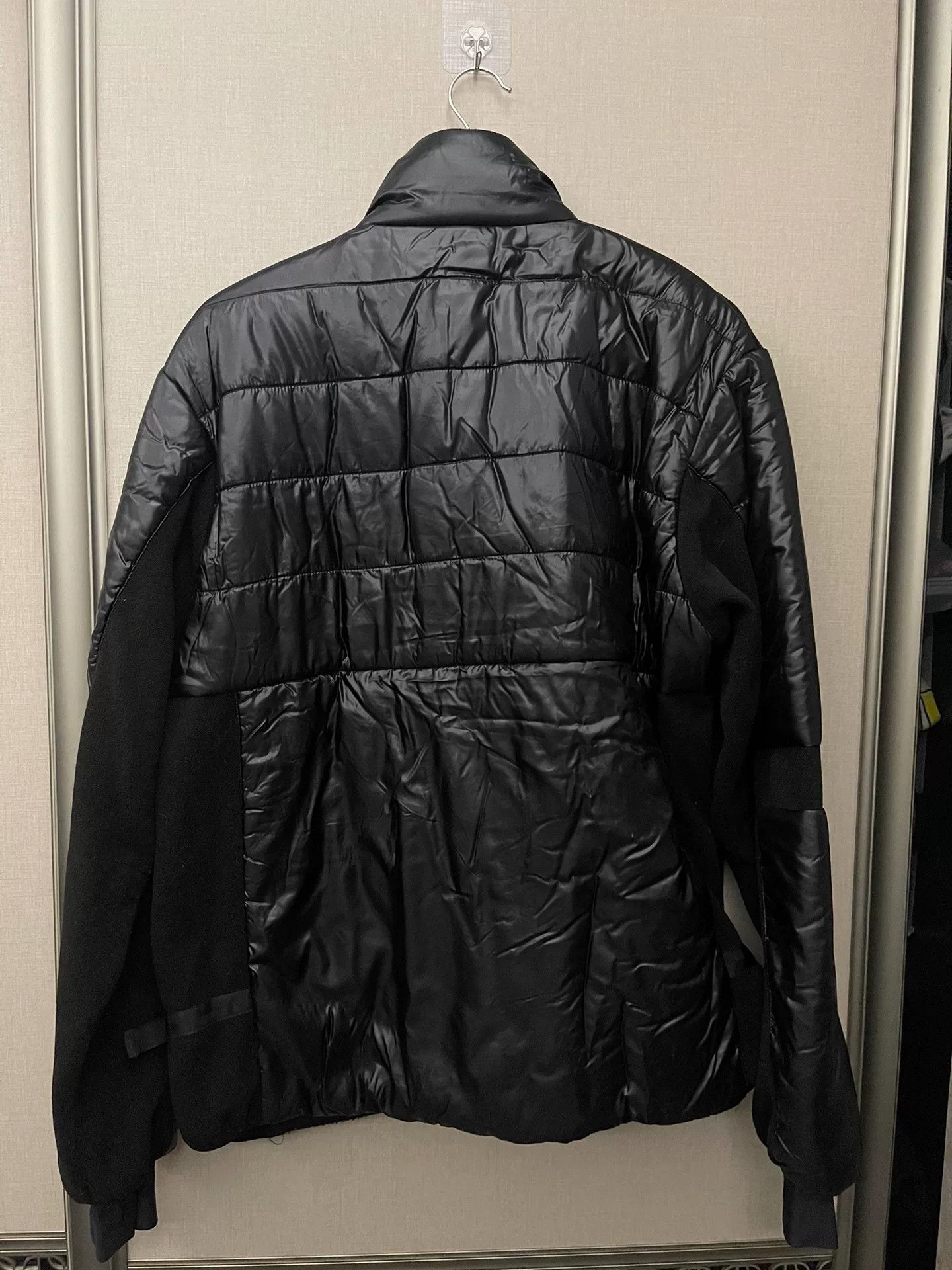 black puffy jacket with hidden pockets