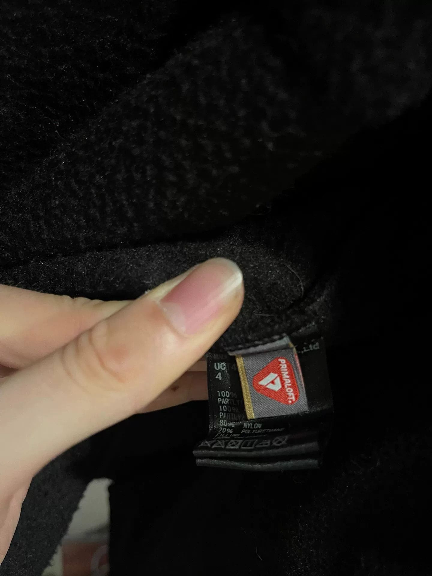 black puffy jacket with hidden pockets