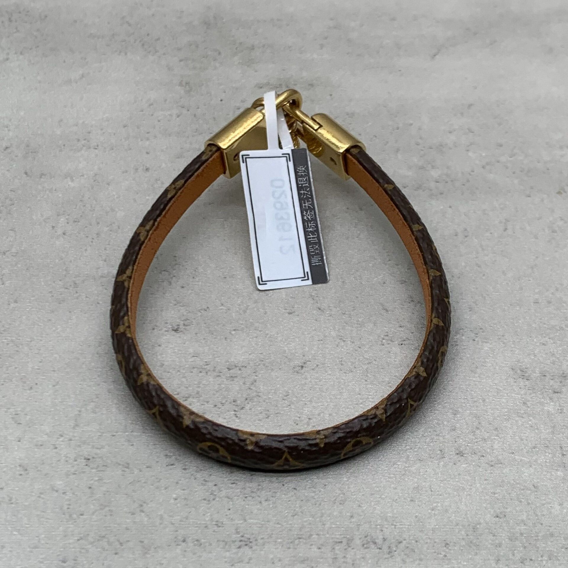 Louis Vuitton lv brown monogram bracelet with gold clasp Size ONE SIZE - 3 Thumbnail
