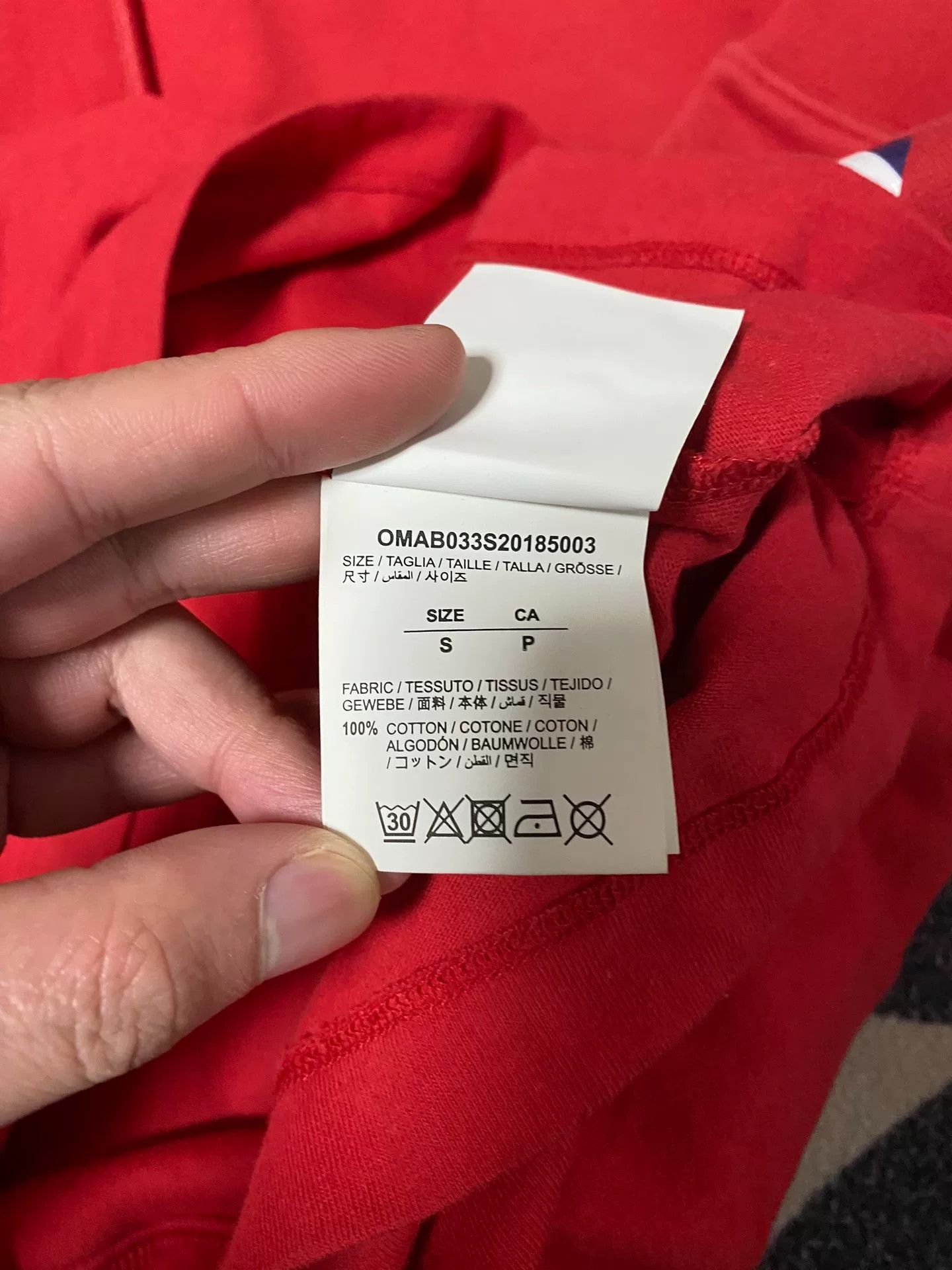 red oversized graphic hoodie with tags
