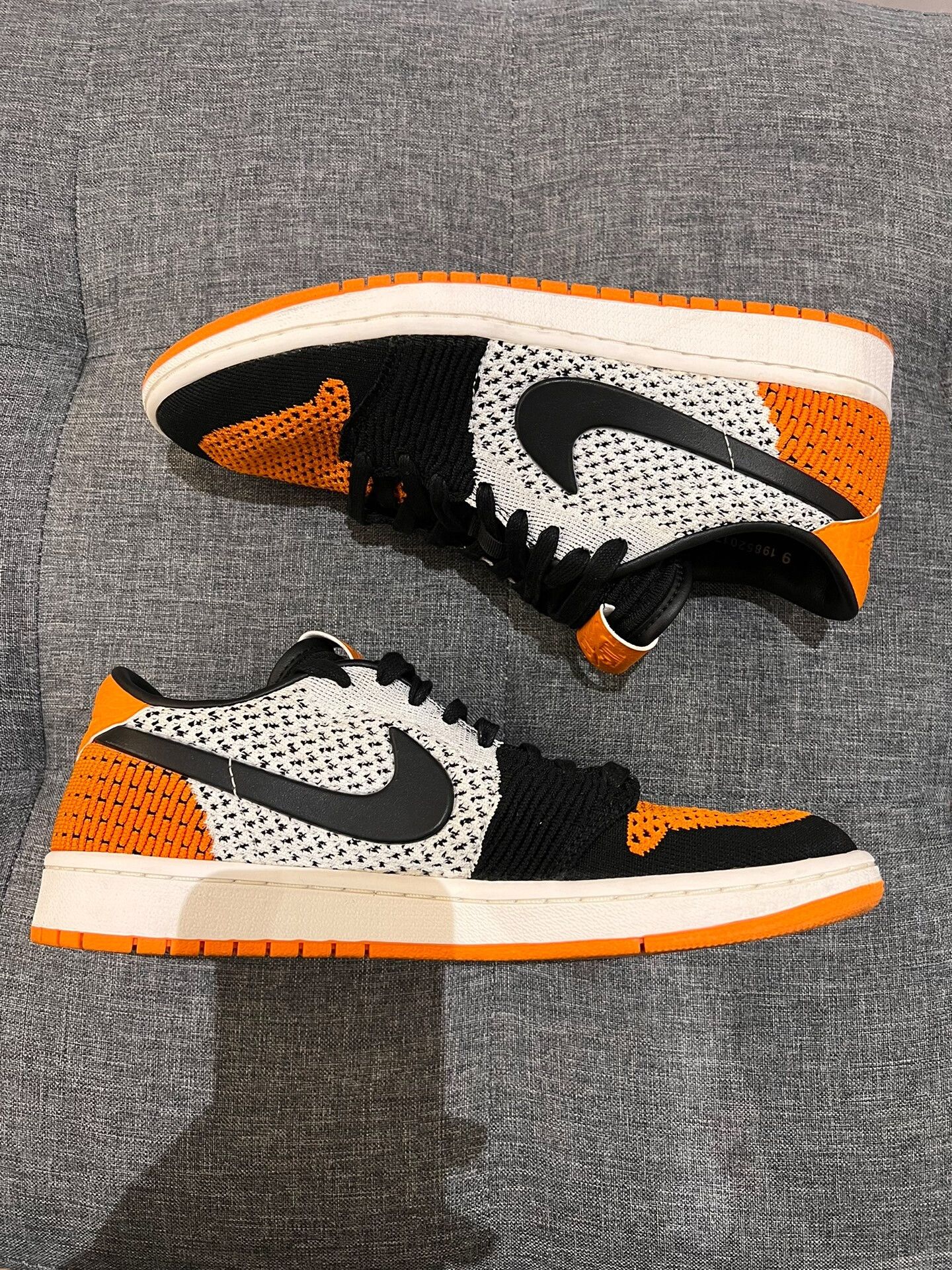 Jordan Brand aj1 low flyknit black orange sneakers Size US 9.5 / EU 42-43 - 5 Thumbnail
