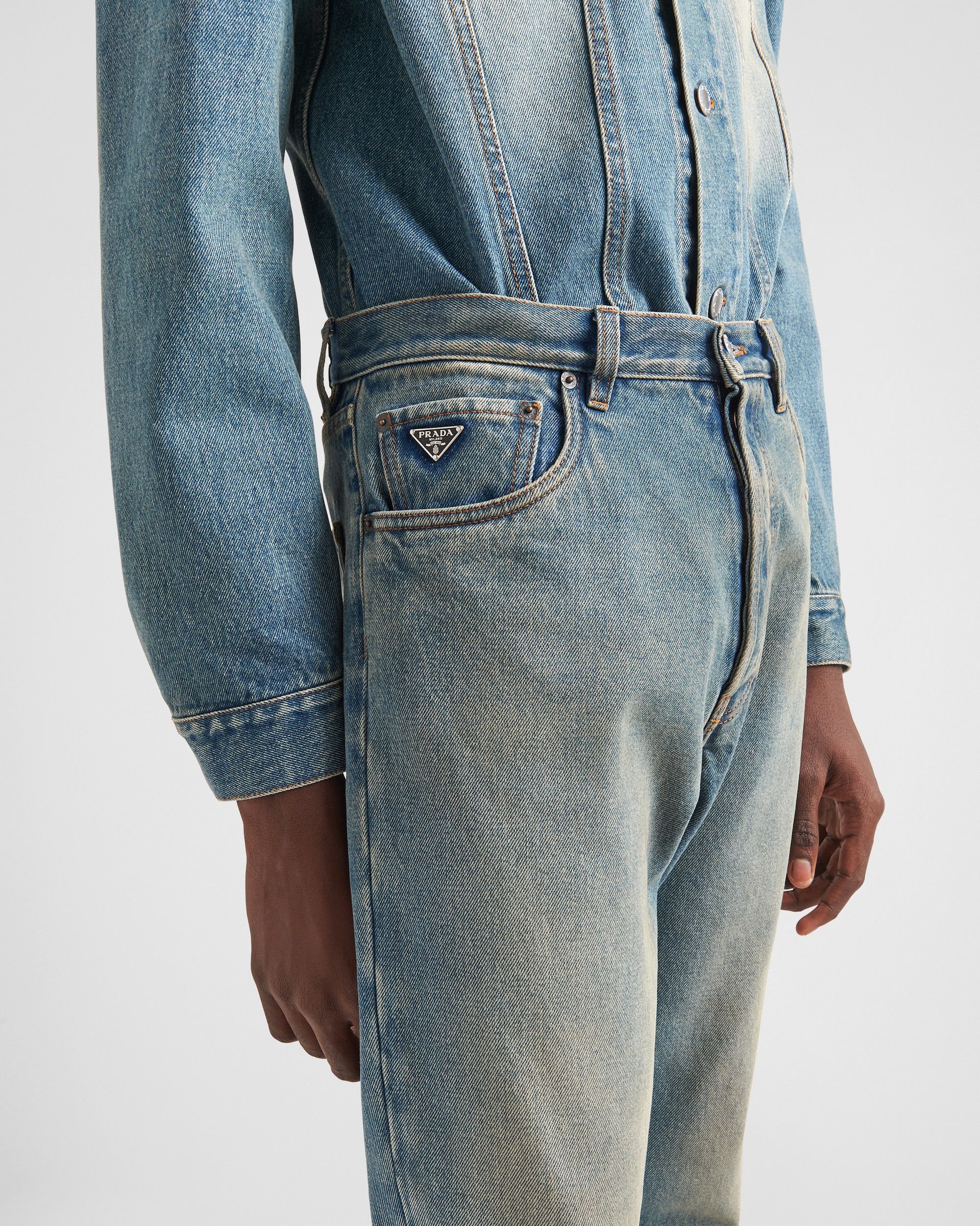 Five-pocket denim jeans with Prada patch