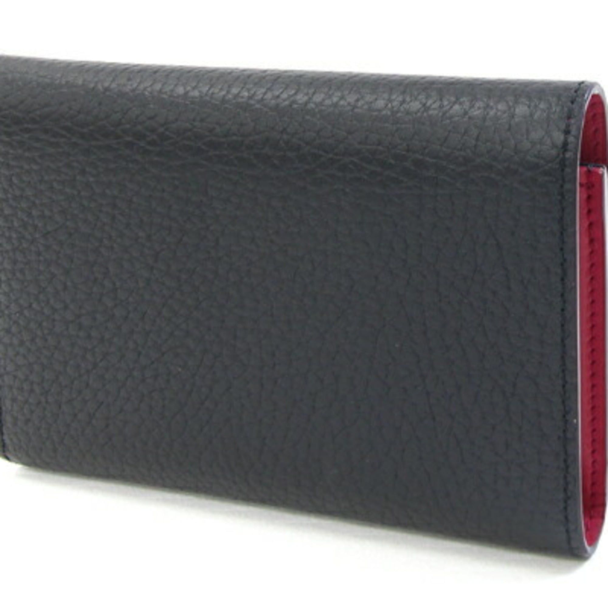 Louis Vuitton Louis Vuitton Portefeuille Capucines Compact Tri-fold Wallet M62157 in Noir and Hot Pink Taurillon Leather. LV Wallet, Two-Tone Design. Women's. LOUIS VUITTON Size ONE SIZE - 2 Thumbnail