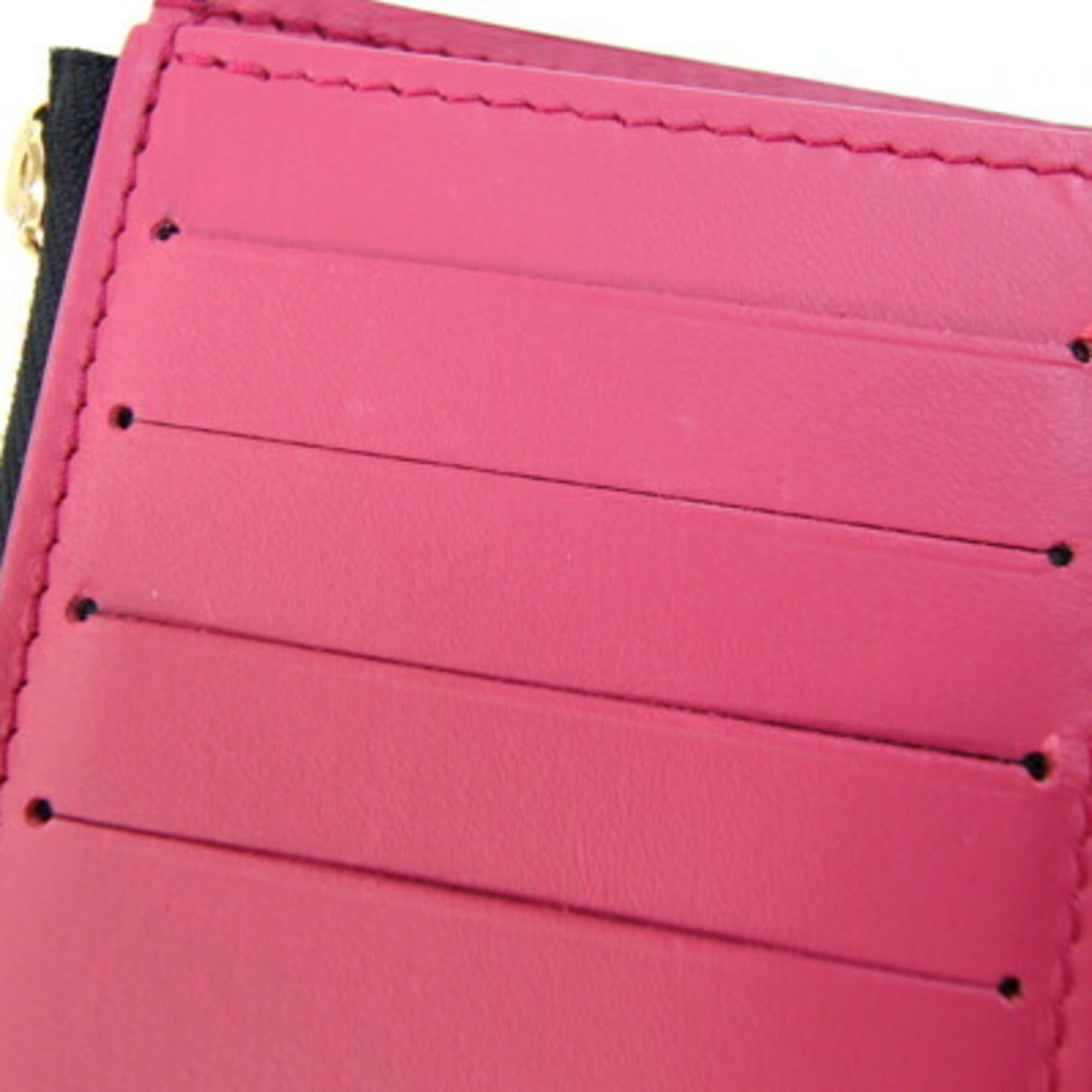 Louis Vuitton Louis Vuitton Portefeuille Capucines Compact Tri-fold Wallet M62157 in Noir and Hot Pink Taurillon Leather. LV Wallet, Two-Tone Design. Women's. LOUIS VUITTON Size ONE SIZE - 7 Thumbnail