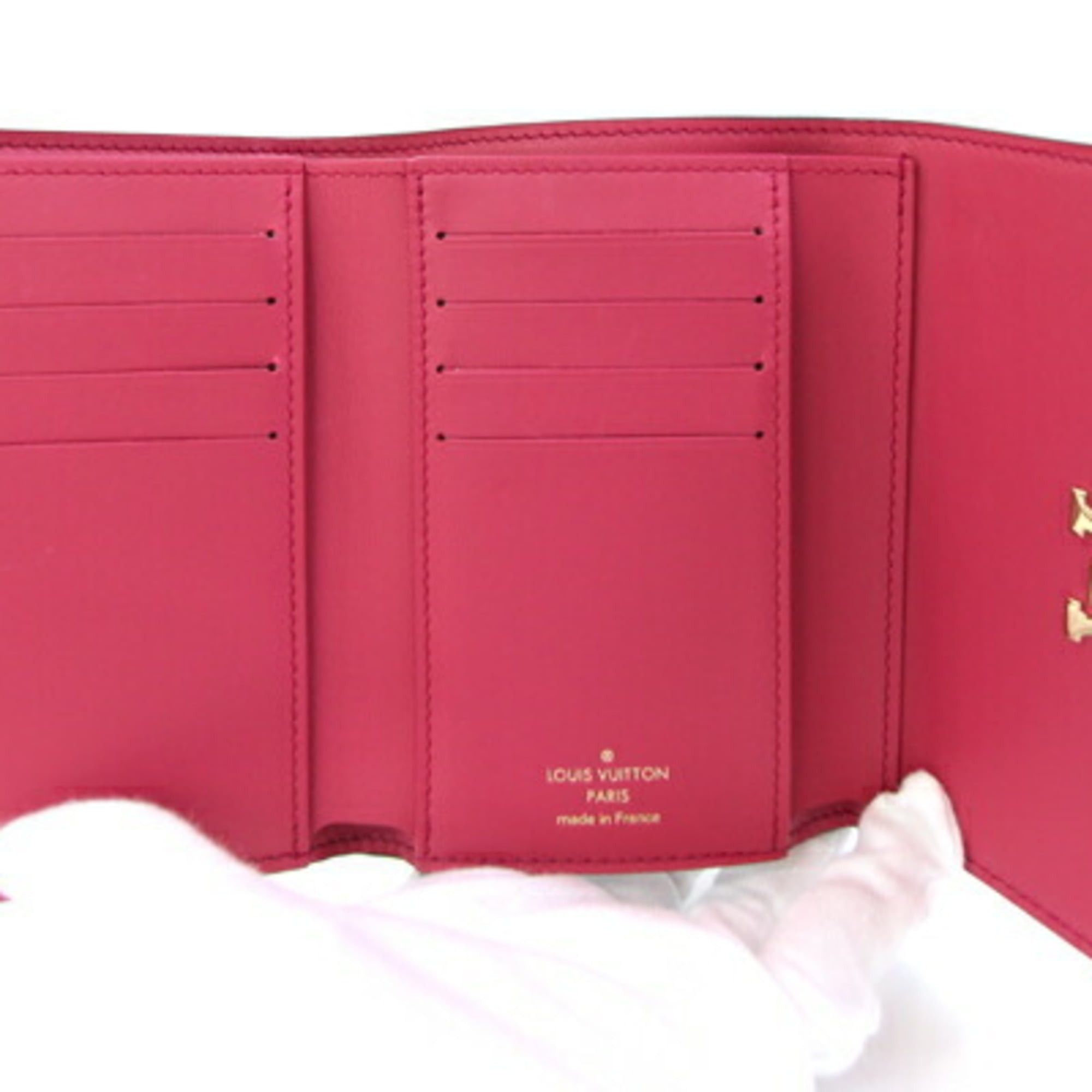 Louis Vuitton Louis Vuitton Portefeuille Capucines Compact Tri-fold Wallet M62157 in Noir and Hot Pink Taurillon Leather. LV Wallet, Two-Tone Design. Women's. LOUIS VUITTON Size ONE SIZE - 4 Thumbnail