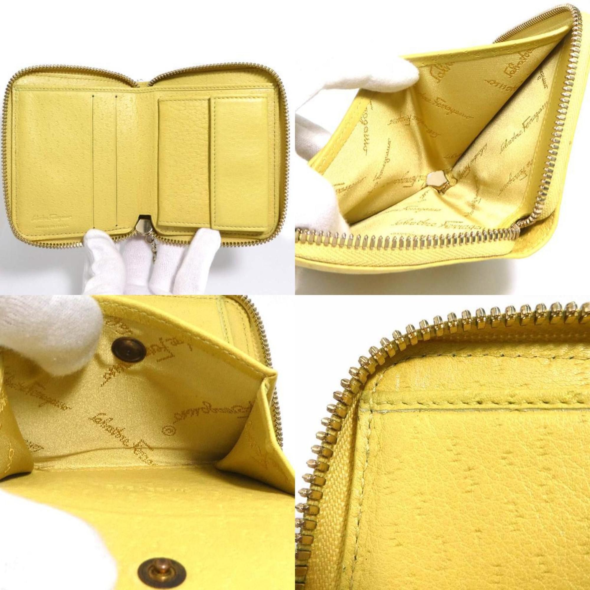 Salvatore Ferragamo Salvatore Ferragamo Gancini Leather Bi-fold Wallet in Mustard Yellow for Women (h31855a) Size ONE SIZE - 4 Thumbnail