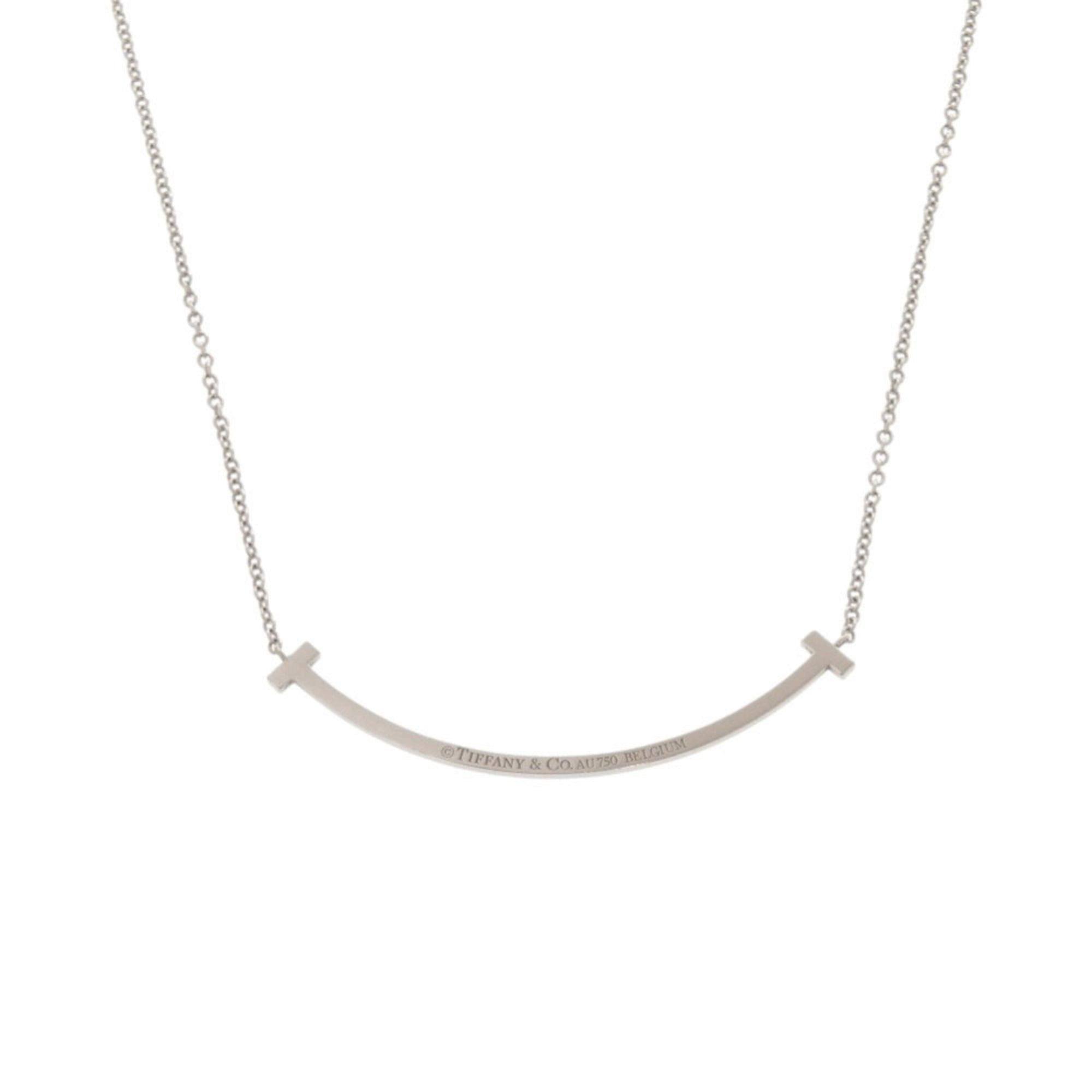 Tiffany & Co. Excellent condition Tiffany T Smile small necklace in 18K white gold with sapphire and 750 gold. Item number 1416. Size ONE SIZE - 2 Thumbnail