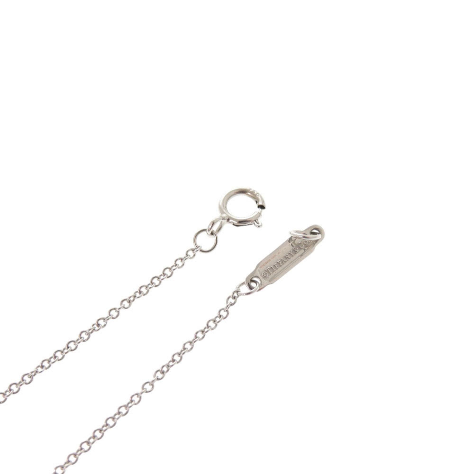 Tiffany & Co. Excellent condition Tiffany T Smile small necklace in 18K white gold with sapphire and 750 gold. Item number 1416. Size ONE SIZE - 7 Thumbnail