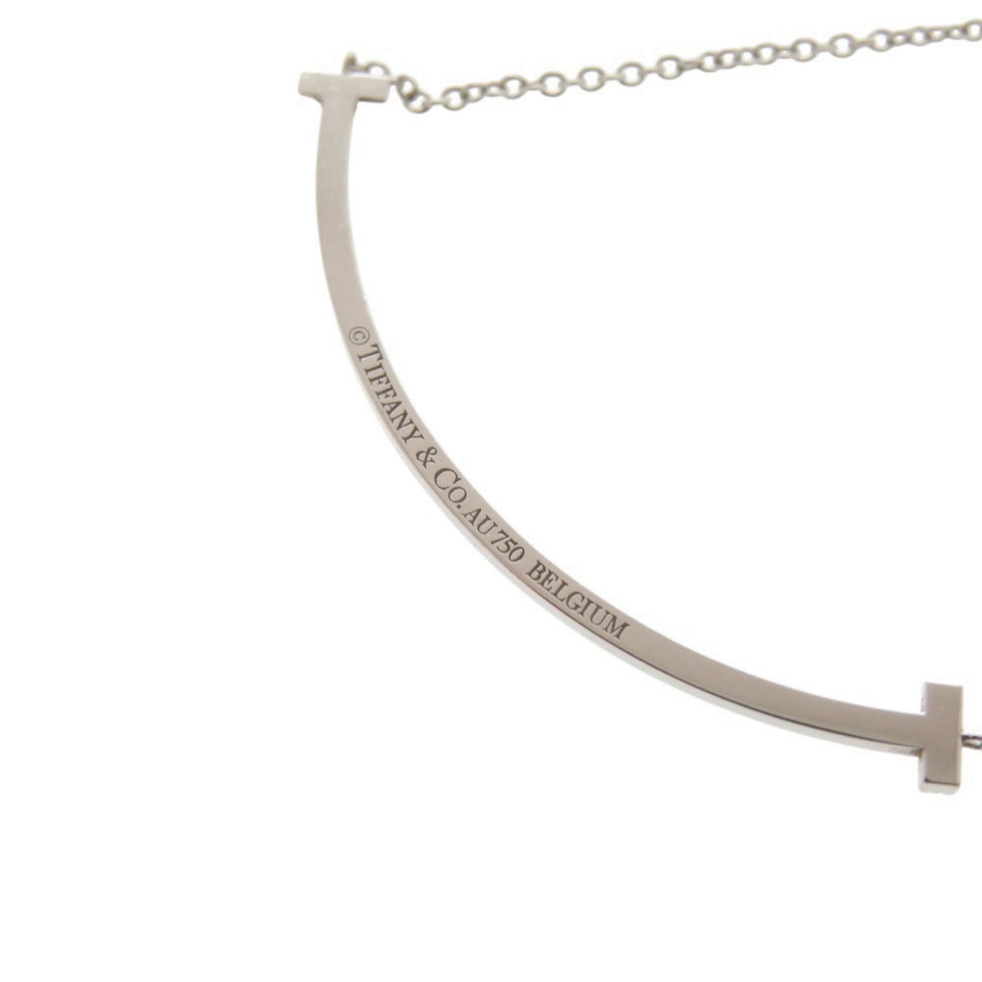 Tiffany & Co. Excellent condition Tiffany T Smile small necklace in 18K white gold with sapphire and 750 gold. Item number 1416. Size ONE SIZE - 4 Thumbnail
