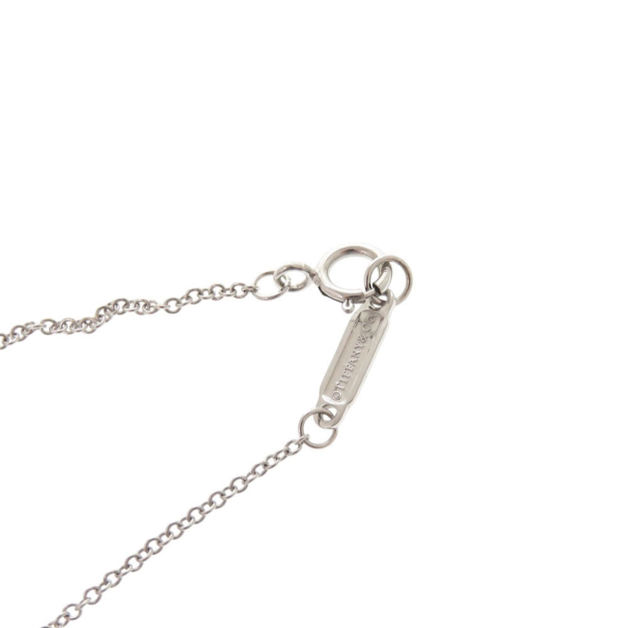 Tiffany & Co. Excellent condition Tiffany T Smile small necklace in 18K white gold with sapphire and 750 gold. Item number 1416. Size ONE SIZE - 5 Thumbnail
