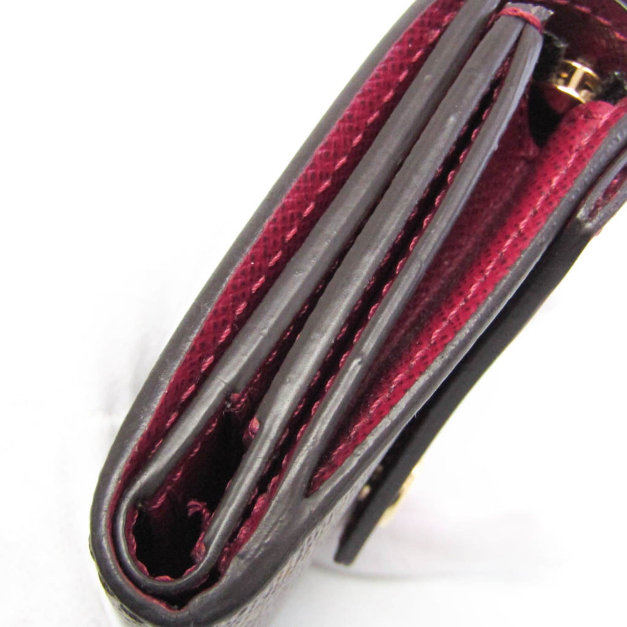 Louis Vuitton Monogram Zoe Wallet M62932 Women's Monogram,Leather Wallet (tri-fold) Brown,Fuchsia