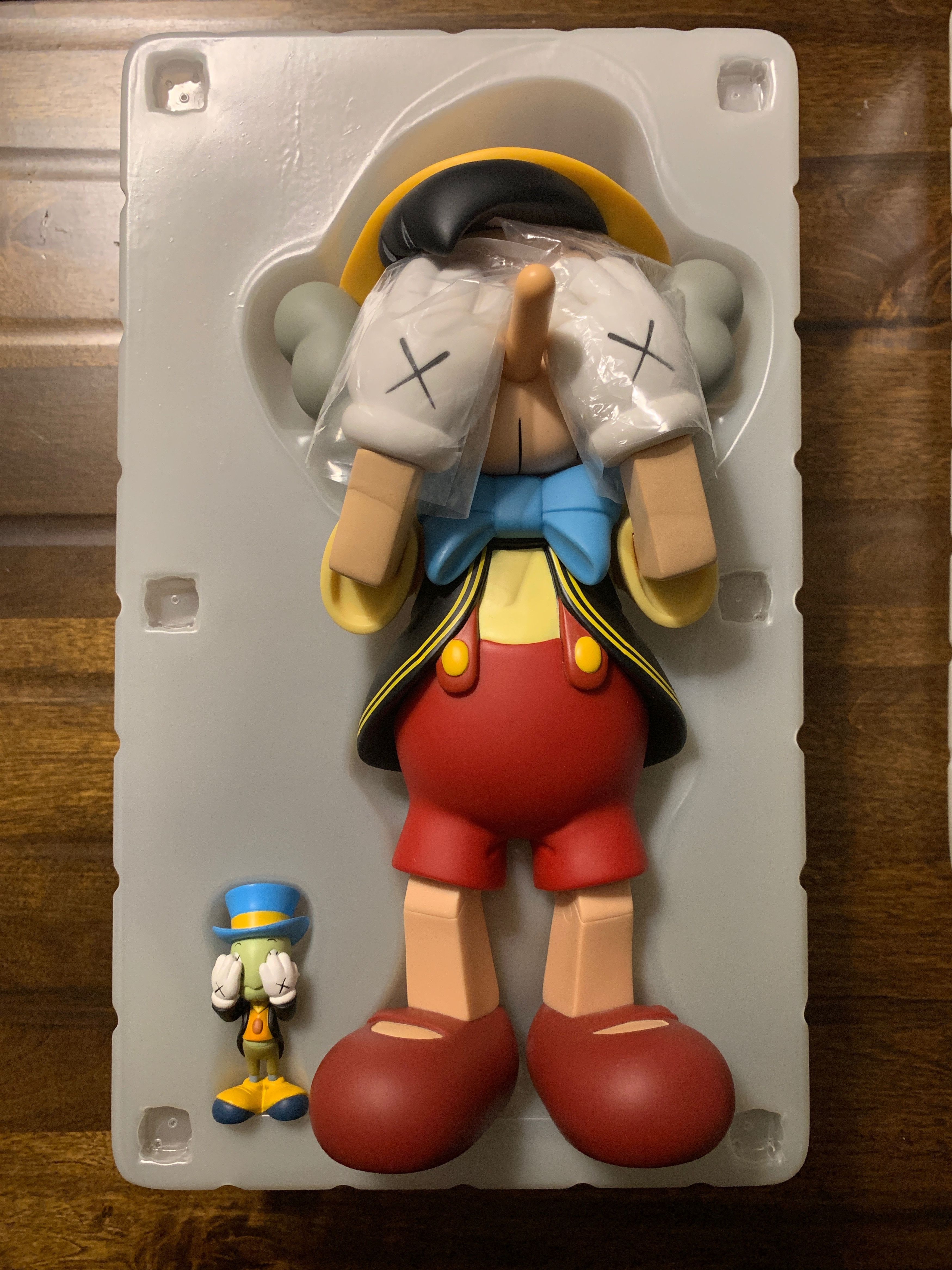 Kaws KAWS - Pinocchio + Jiminy Cricket | Grailed