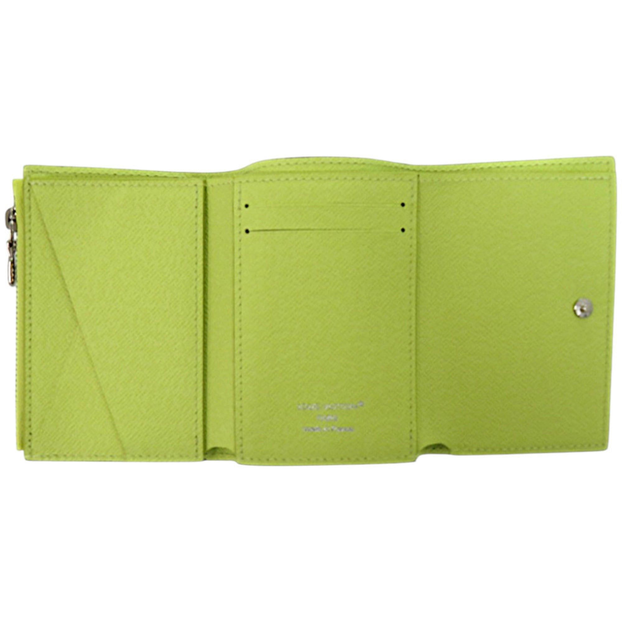 Louis Vuitton Like new Louis Vuitton Monogram Victor Wallet Taiga Rama M14129 in fluorescent yellow. LV yellow tri-fold wallet, 1829. Size ONE SIZE - 4 Thumbnail
